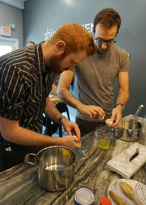Nick and Chris having never separated egg yolks before compete in a test of speed and agility.