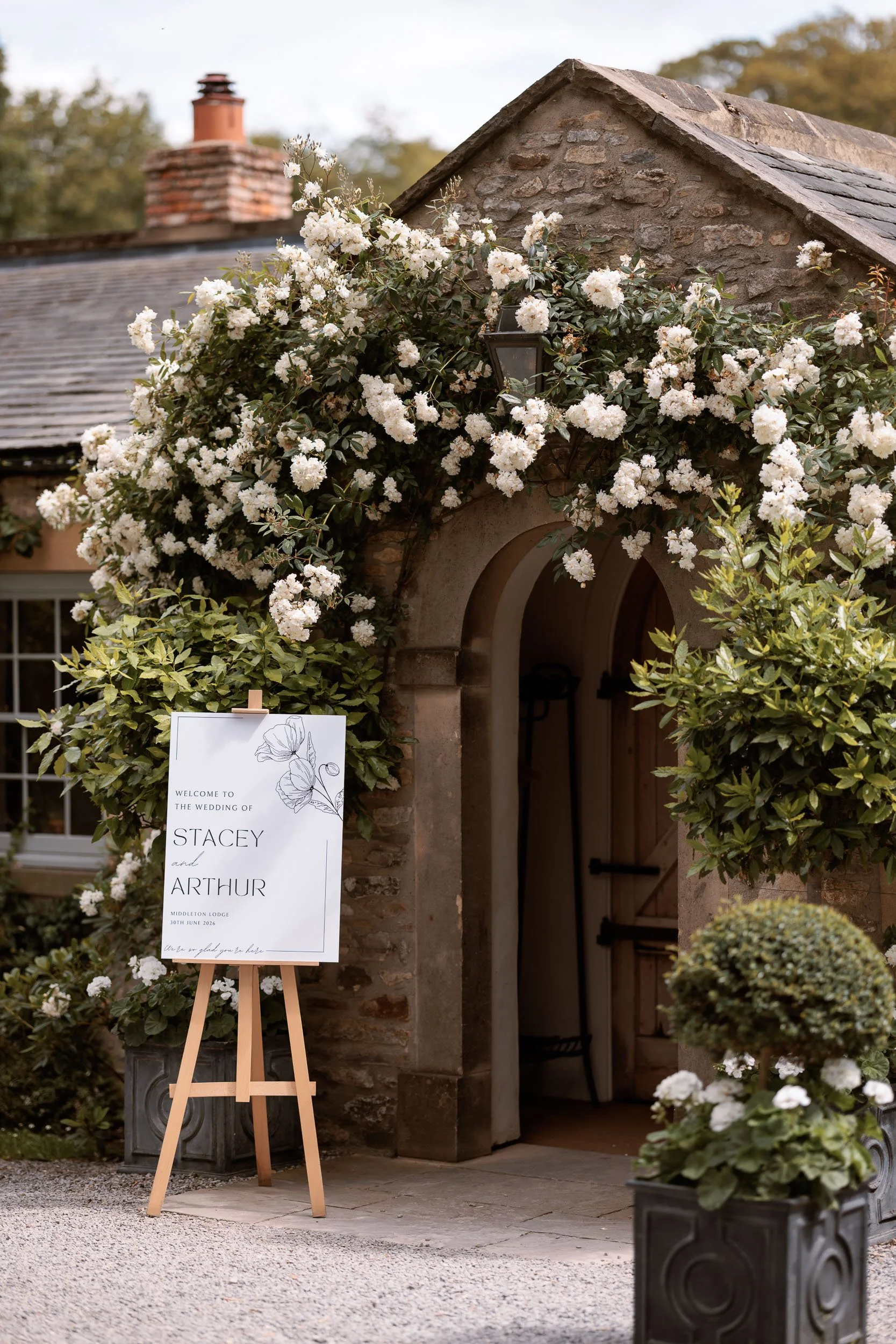 Flower-covered entrance to the Fig House at Middleton Lodge.