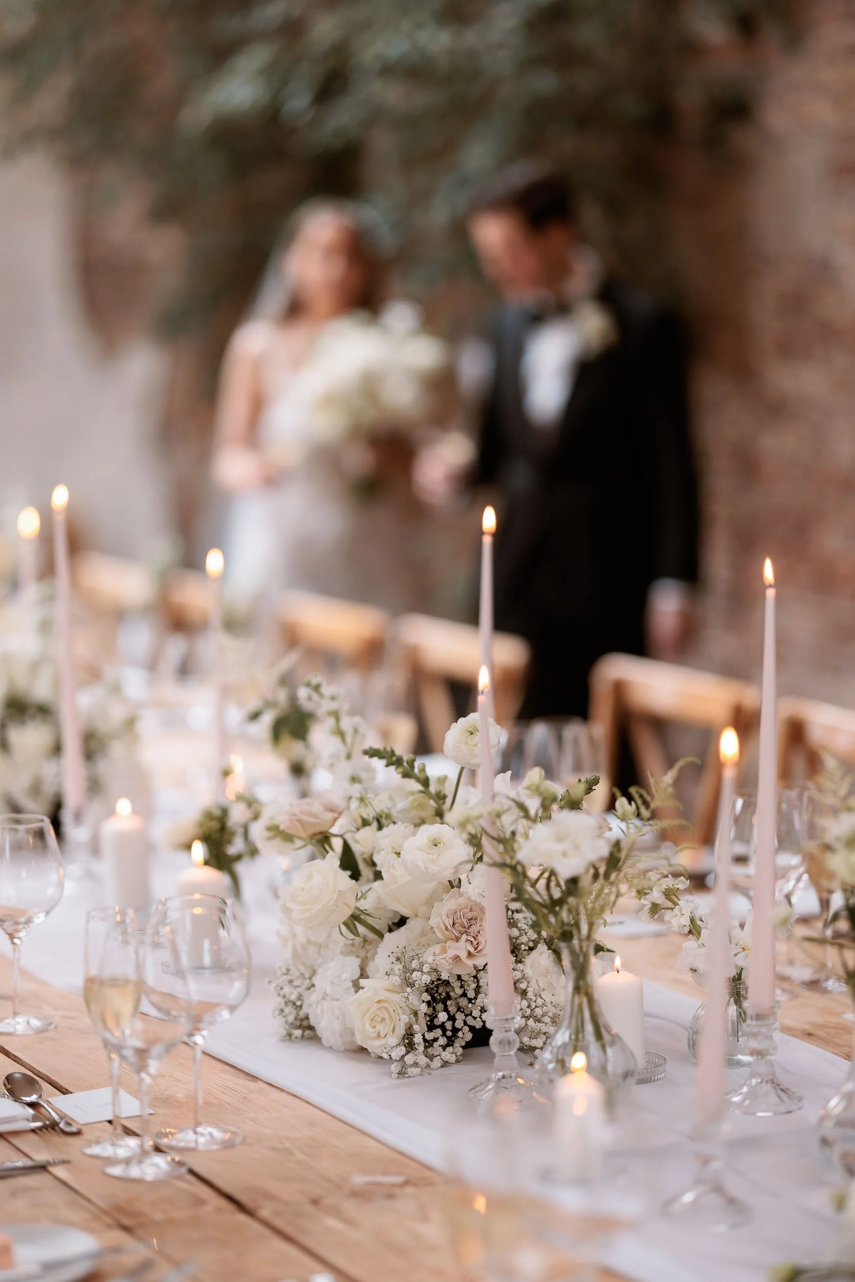 Floral table styling during a wedding breakfast at Middleton Lodge.