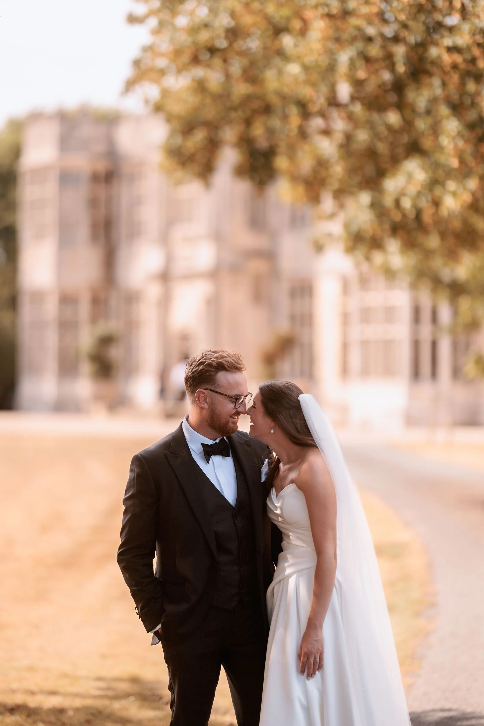 Hannah and Josh together in the grounds of Howsham Hall on their wedding day.