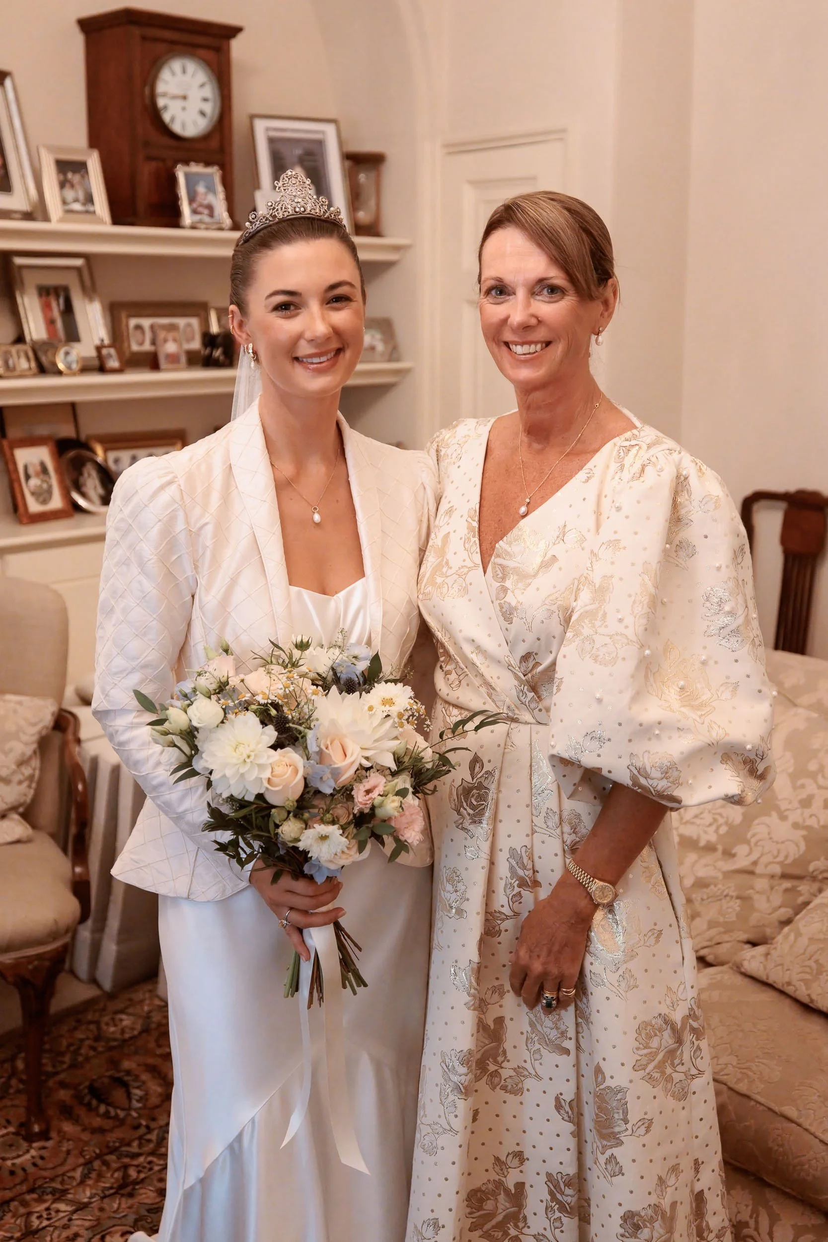Alicia sharing a moment with her mother before the wedding ceremony.