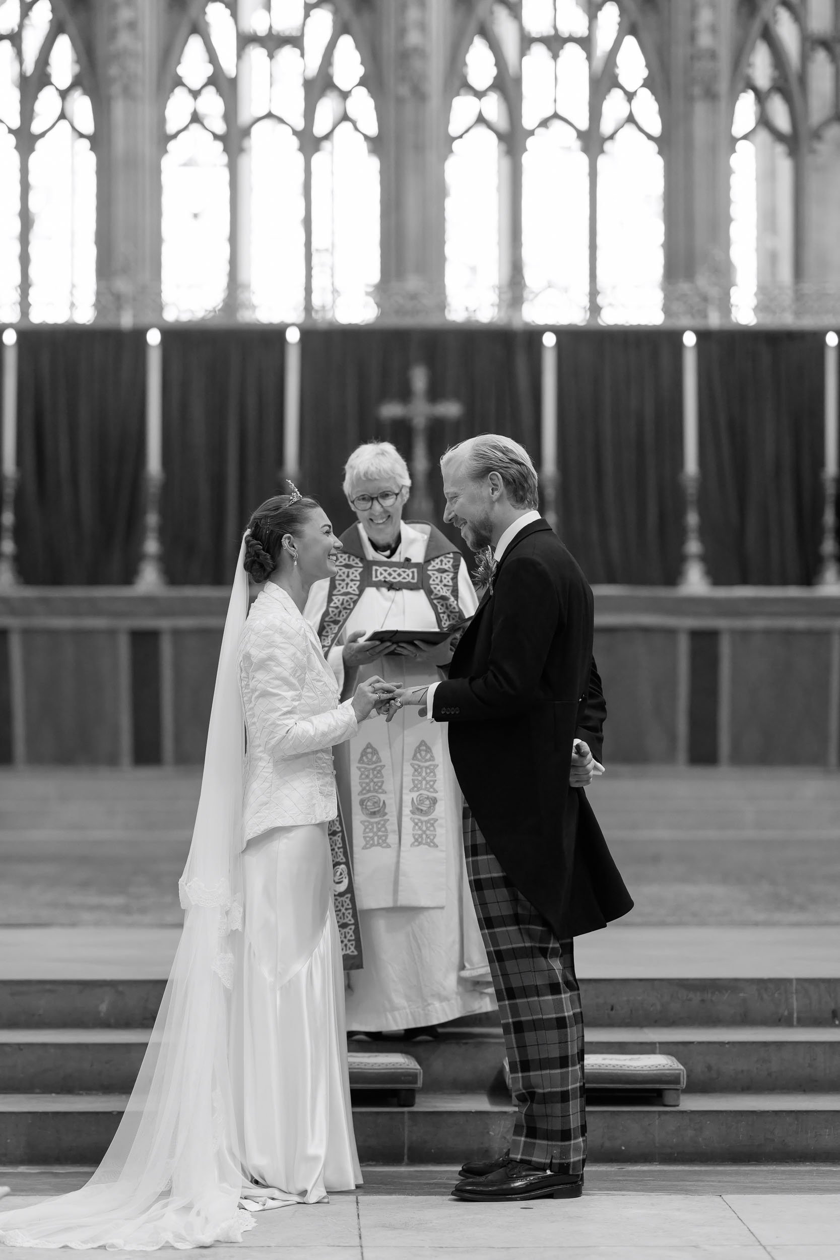Black and white photograph during Alicia and Max's York Minster wedding ceremony.