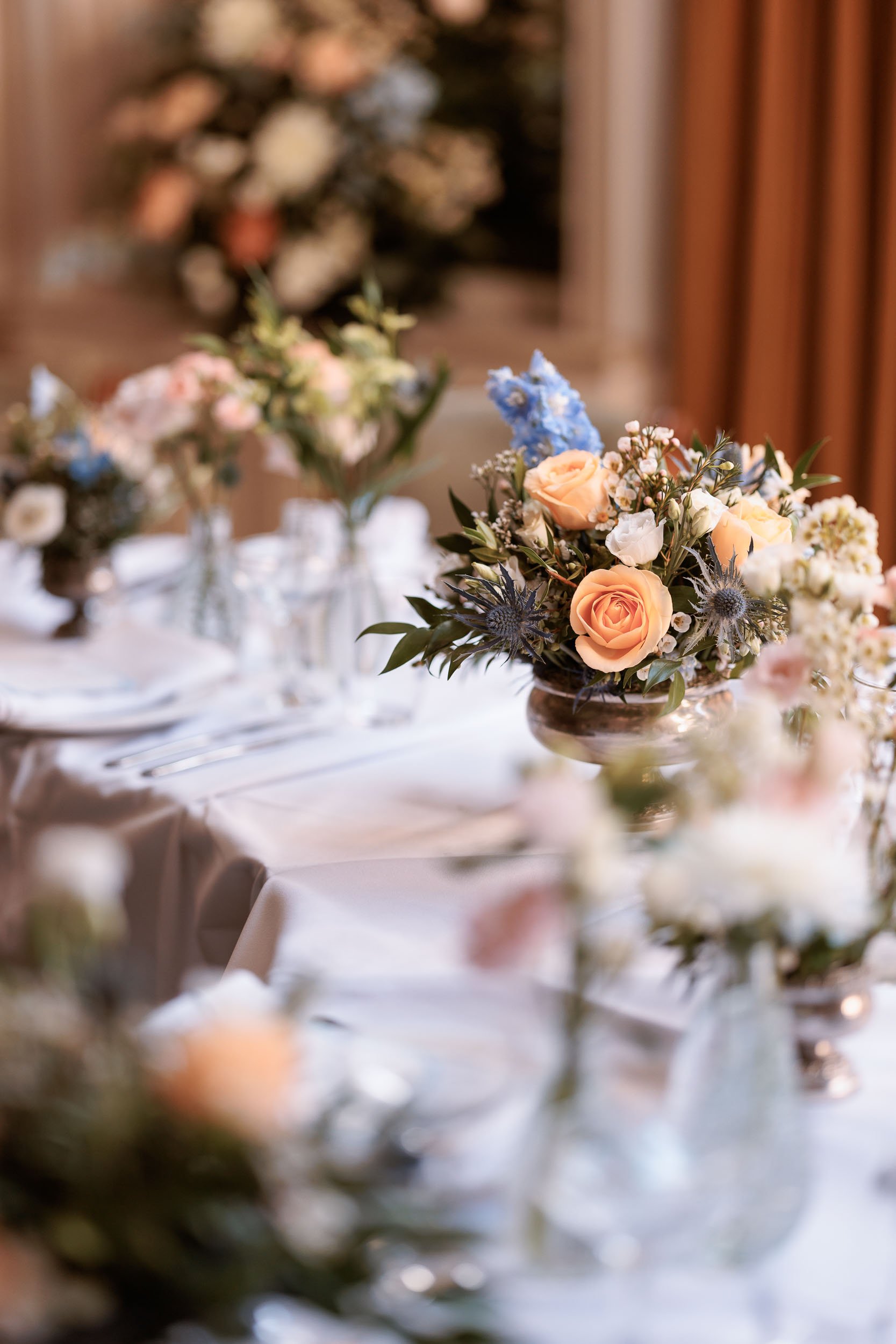 Floral arrangement and table details from Alicia and Max's wedding breakfast.