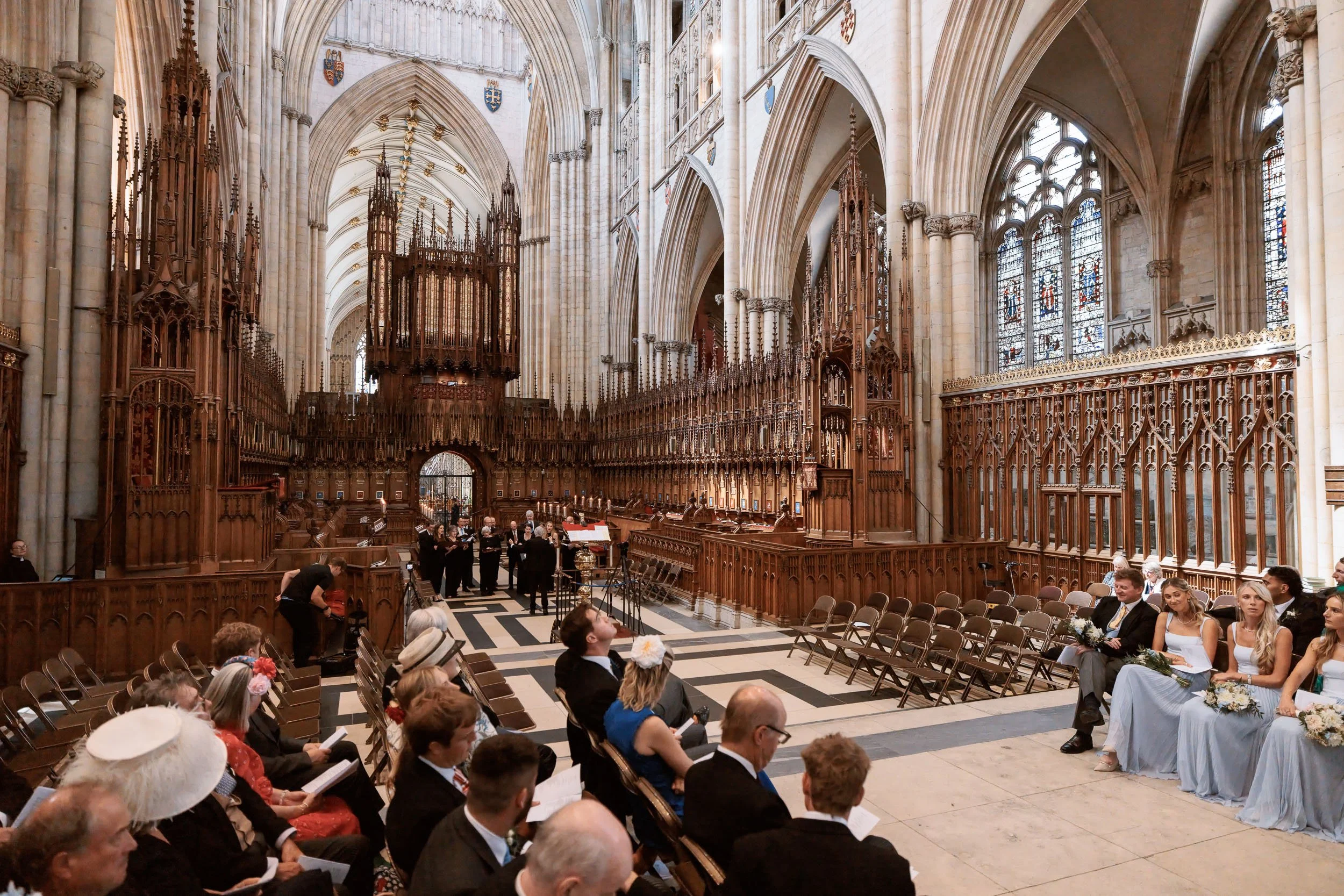 Wide architectural view inside York Minster showing the organ and historic interior.