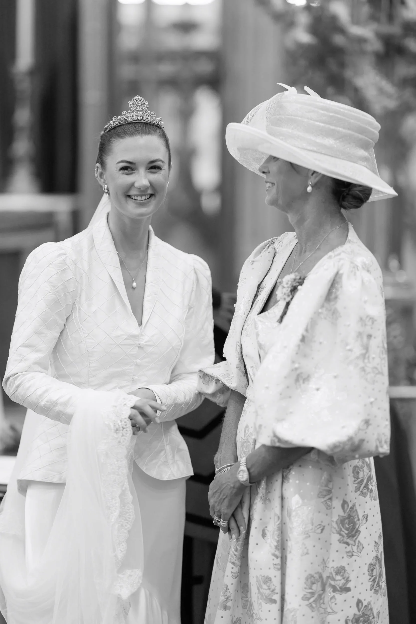Bride sharing a moment with her mother before the wedding ceremony