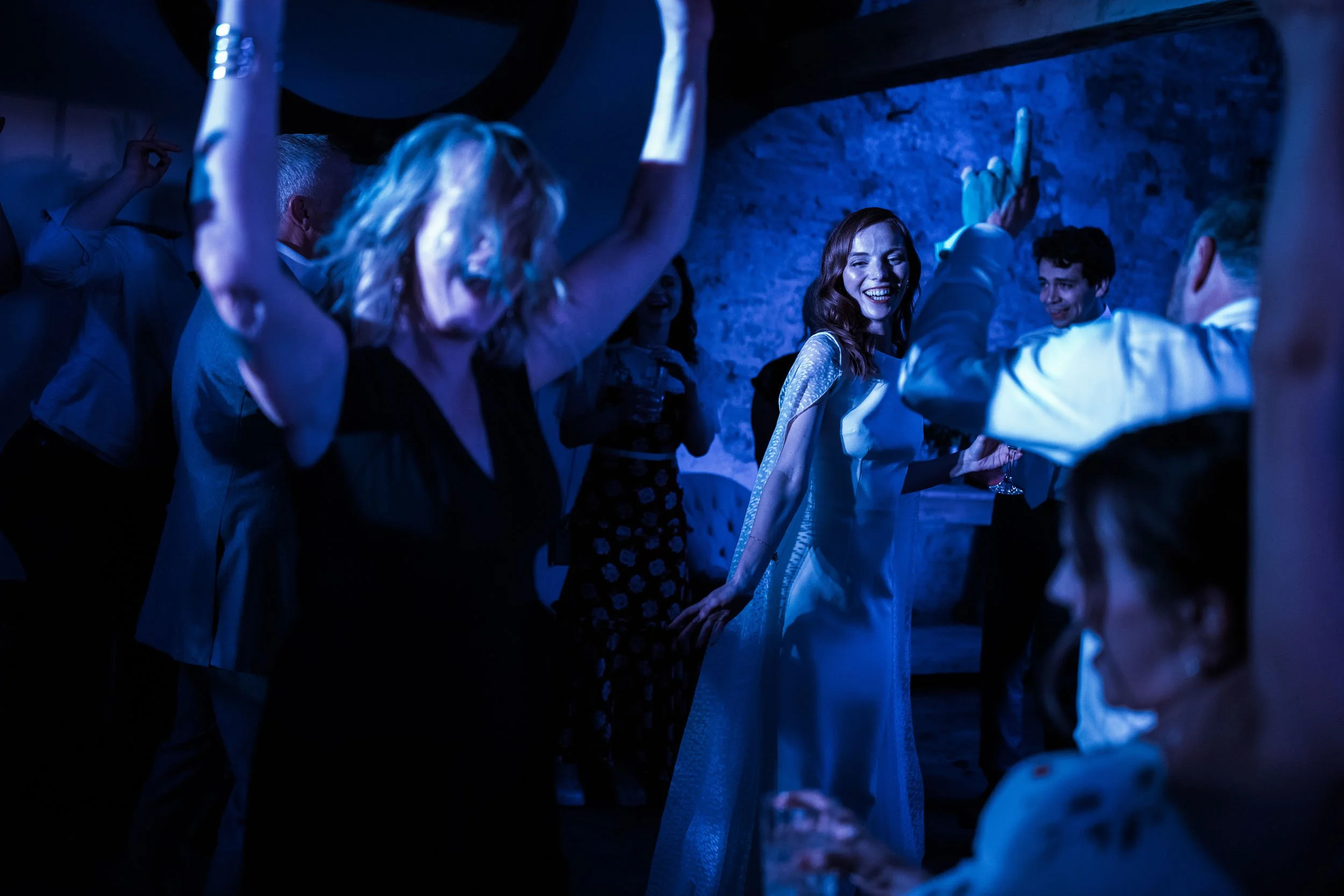 Wedding guests dancing during an evening celebration at Middleton Lodge.