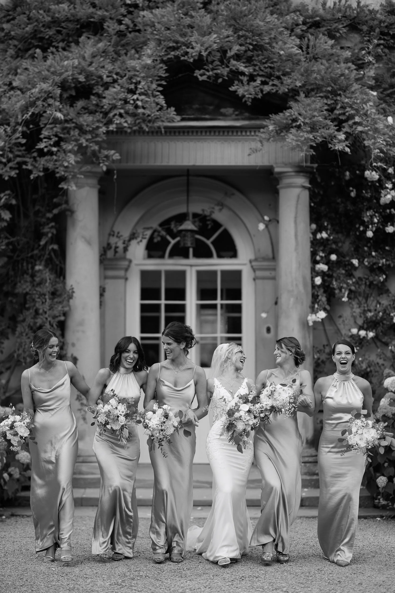 Bridesmaids outside the Main House at Middleton Lodge.