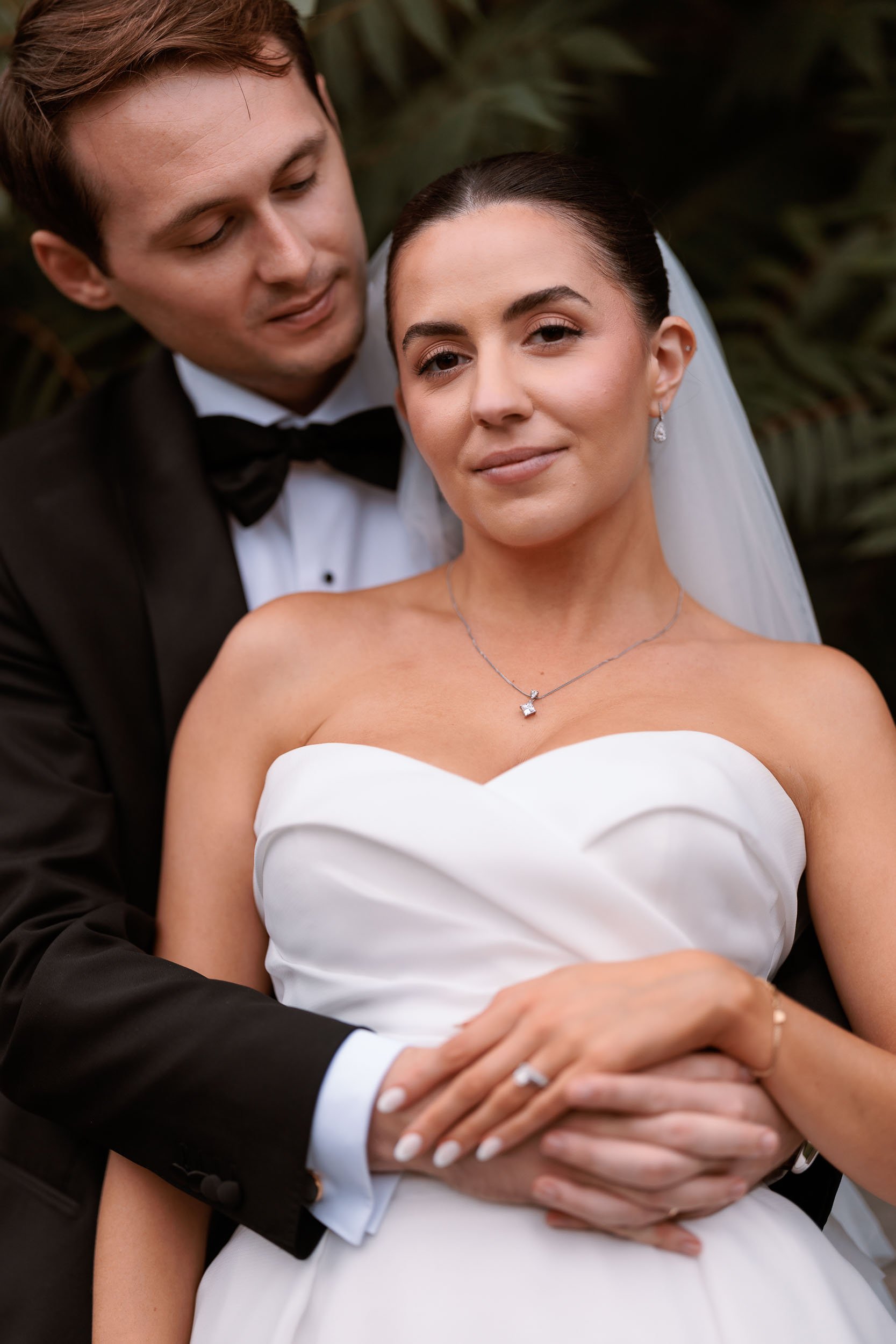 Close portrait of newlyweds together during their Middleton Lodge wedding.