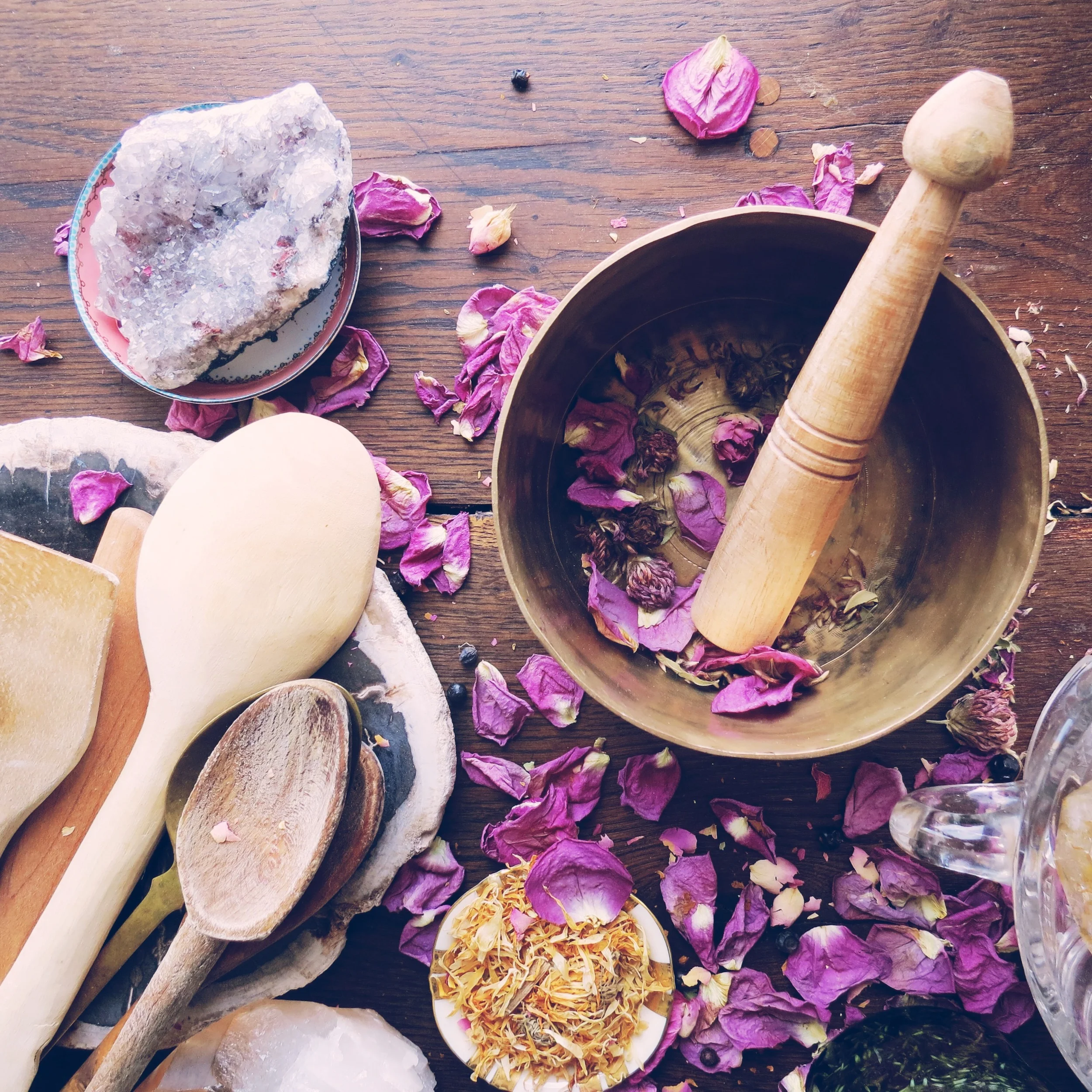 In my city workshop, I craft onto of a 1850 circa Parisian farm table. This is my intimate work space for hand-making Folk, mixing herbs, and measuring botanicals. I stir with my grandfathers wooden spoon and store my remedies next to crystals and favorite objects.