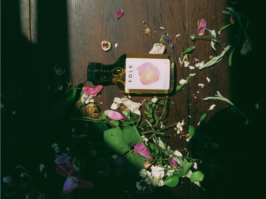 Folk Ayurveda's Vata Body Oil is a rich combination of ingredients. Rooted Rose warms the heart, softens the skin, and grounds your focus with wild rose, cardamon, and pomegranate oil. Purchase here.