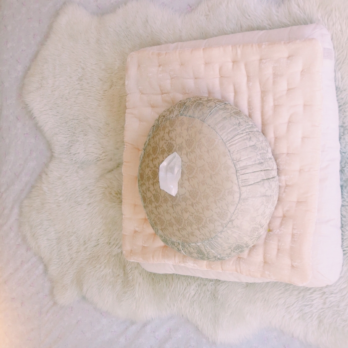 Close to my farm table, I have my meditation cushion .