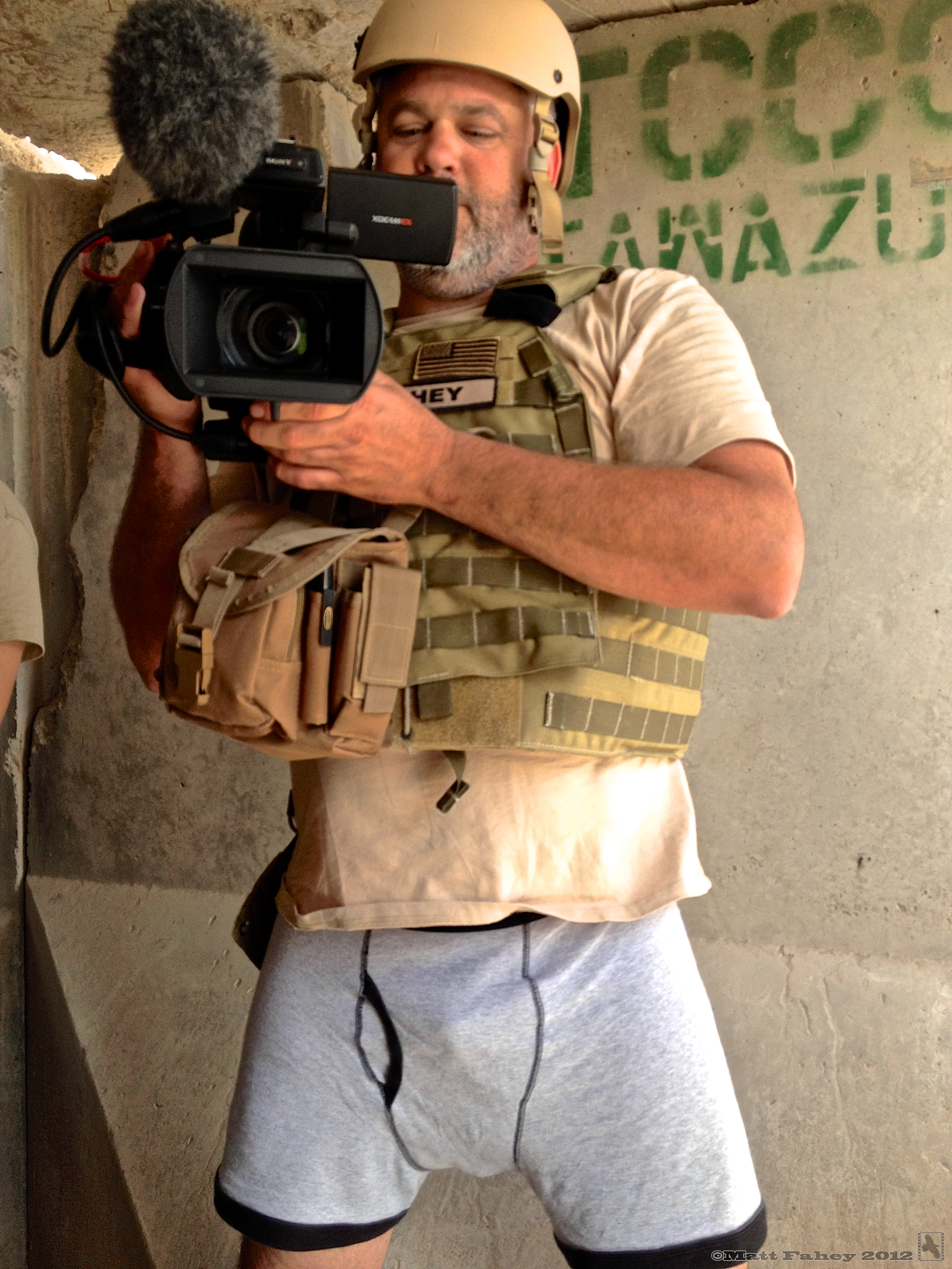 The choice was simple: body armor or pants? H iding in a blast bunker from indirect fire, Kandahar Airfield, Afghanistan, July 2012. 