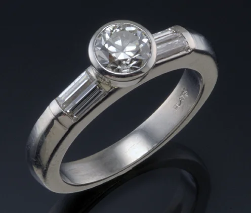 Platinum and Diamond Engagement Ring with Diamond Baguettes