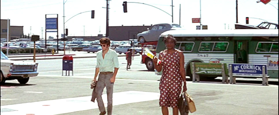 Zabriskie Point The character in dialog with the space - a place not conducive to human interaction but made for cars and buses.