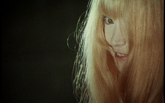 Toby Dammit Shot and counter shot - the girl is enveloped in the black space of a void - the terror of nothingness.