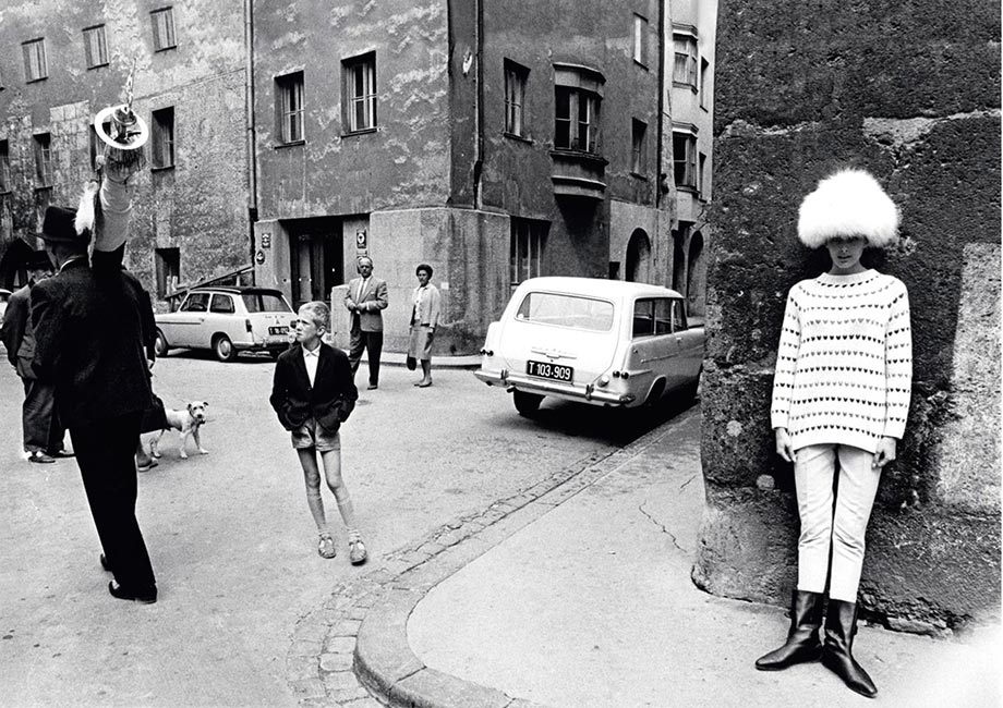 Ronald Traeger, Model Tamara Nyman, Vogue 1963 Documentary realism and fashion share the same stage and the principal player is no longer the model, who now shares the space with a young boy indifferent to her dramatic outfit. The delicate geometry of the space and its local inhabitants beautifully play off the model as in musical counterpoint.