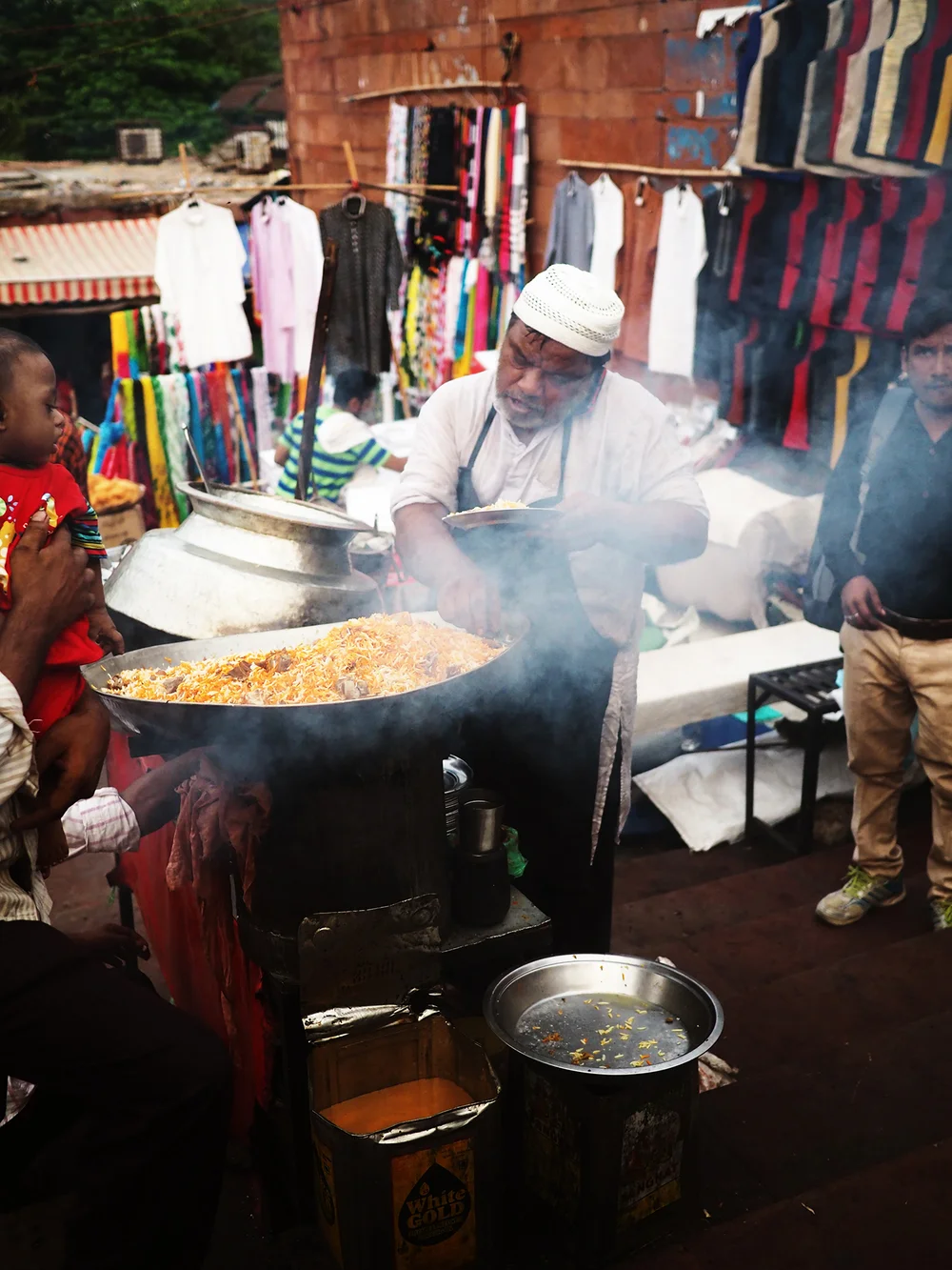 Hot biryani sold on the streets outside the Masjid.