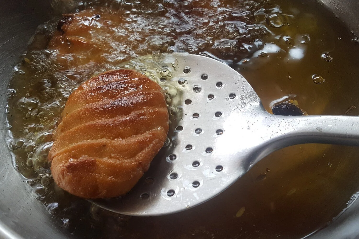 Golden thekua, freshly prepared and ready to share