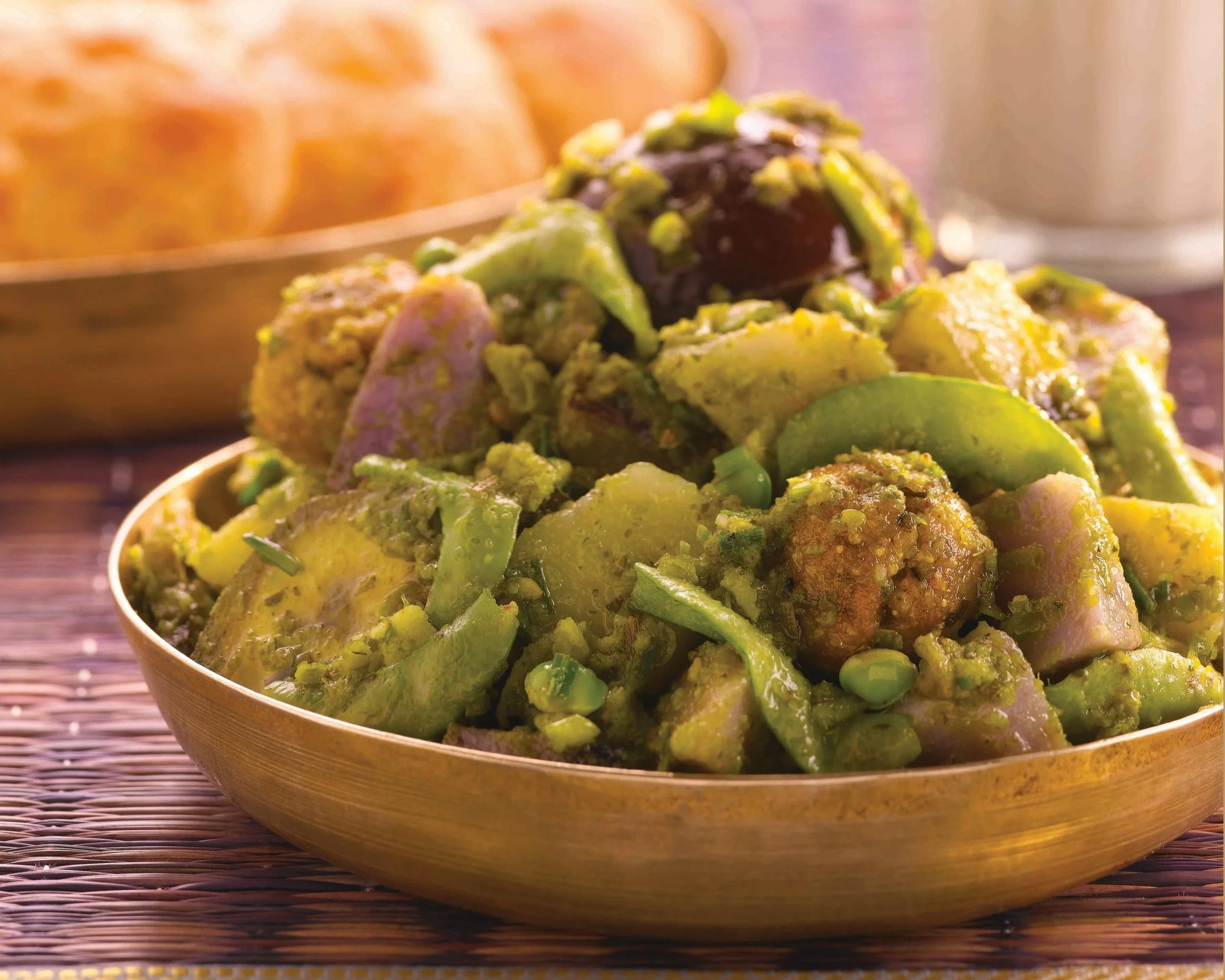 Surti Undhiyu - Traditional mixed vegetable curry with green beans, muthia, and Surti spices