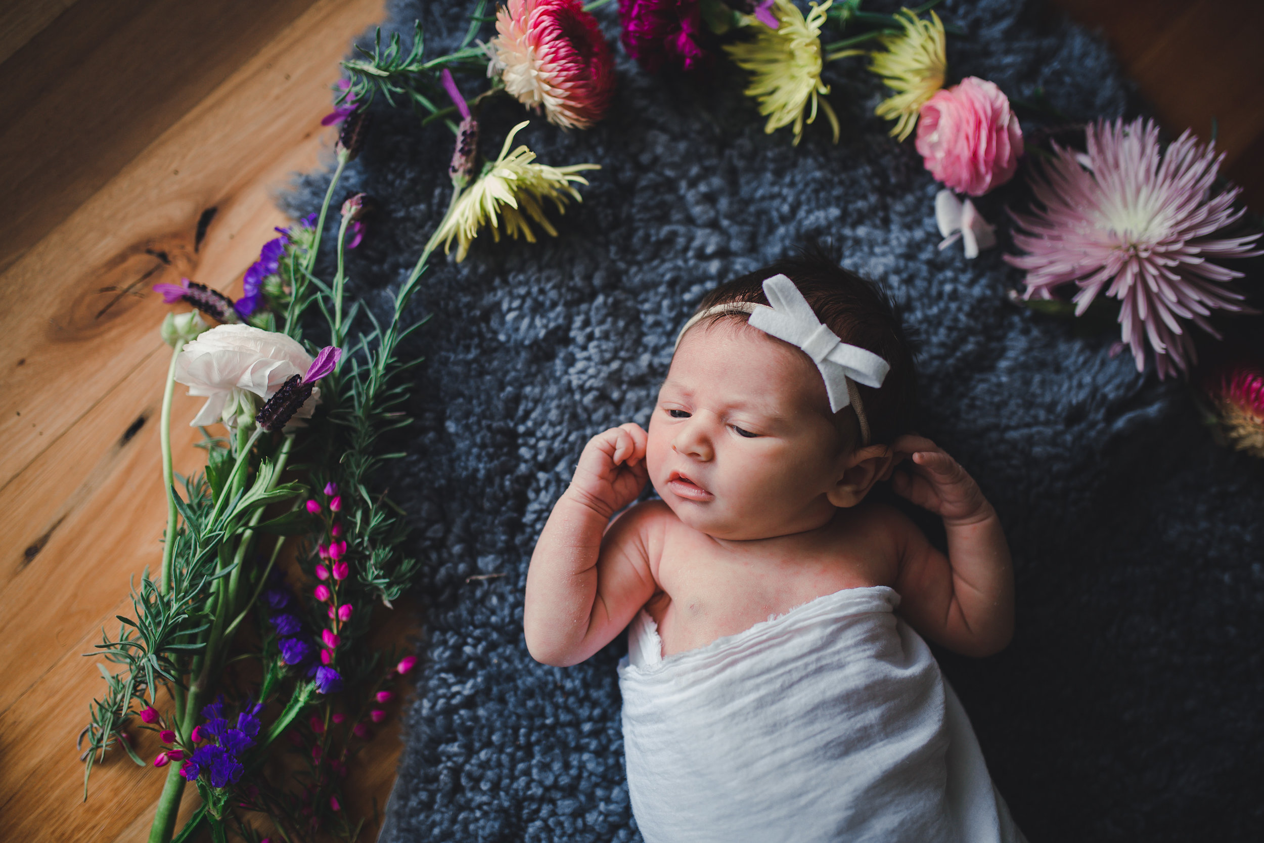 Newborn in flowers