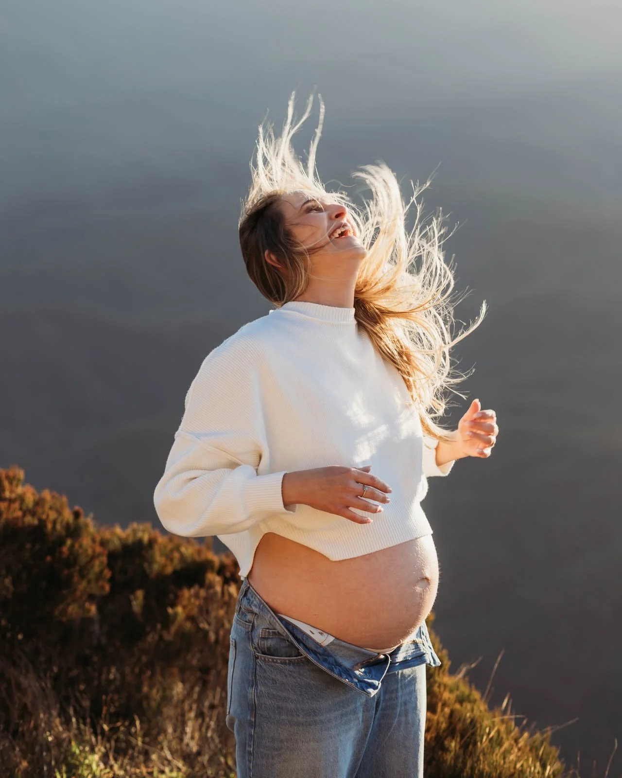 Could this be any more stunning? This was one of the windiest days I have ever photographed  during and it was wild.  We had so much fun shooting this beautiful session and this will always be one of my most favourite bump photos.  Embrace the weathe