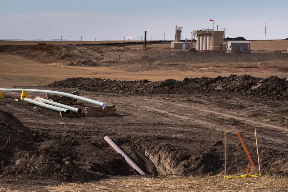 Pipe work and fugitive gas, Near Williston, North Dakota, USA