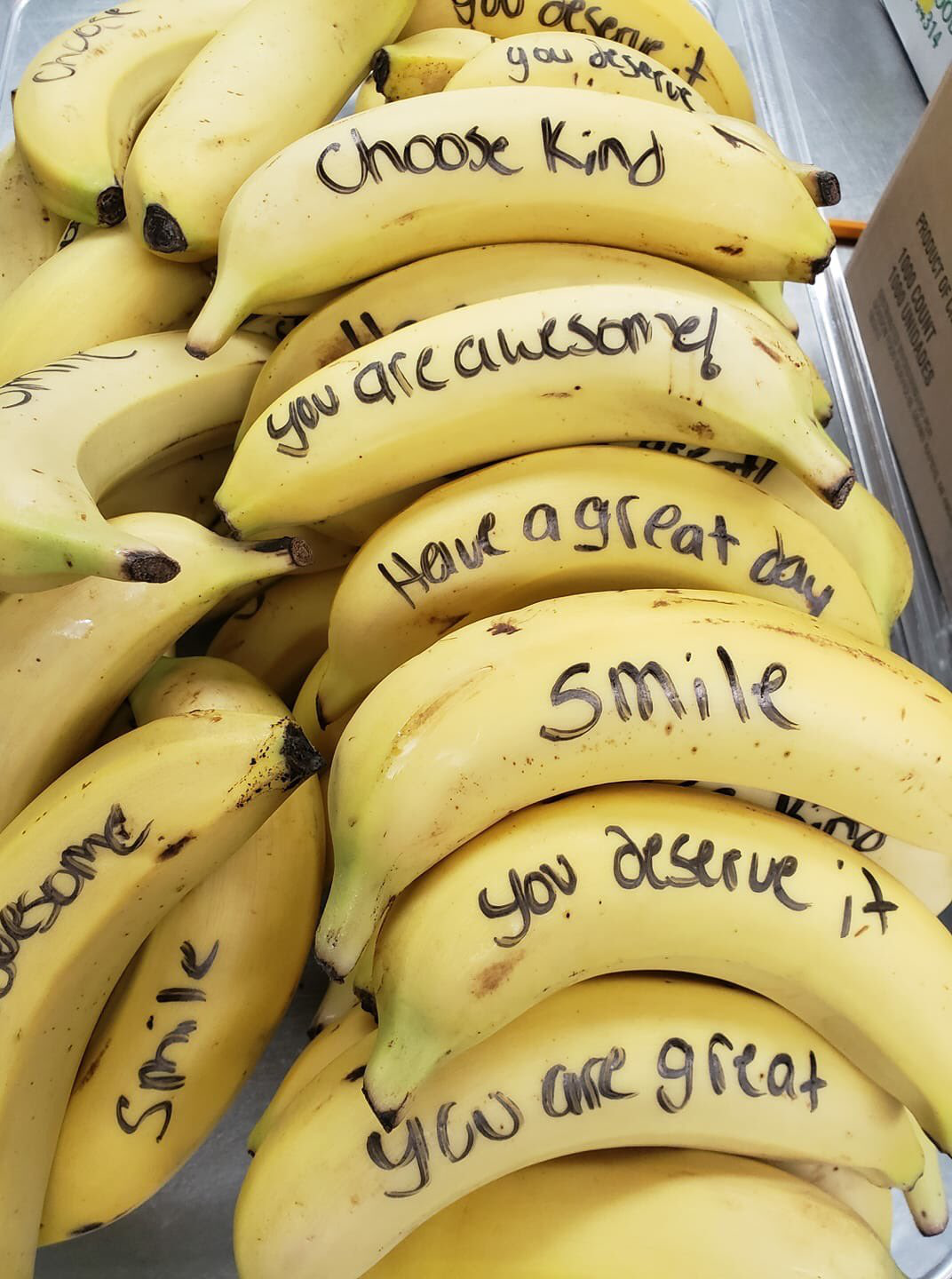 Bananas with positive messages written on them as a way to promote healthy eating.