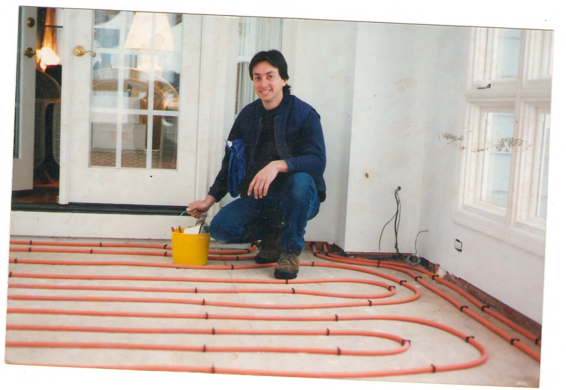 Tom installing radiant heating, a comfort heating system