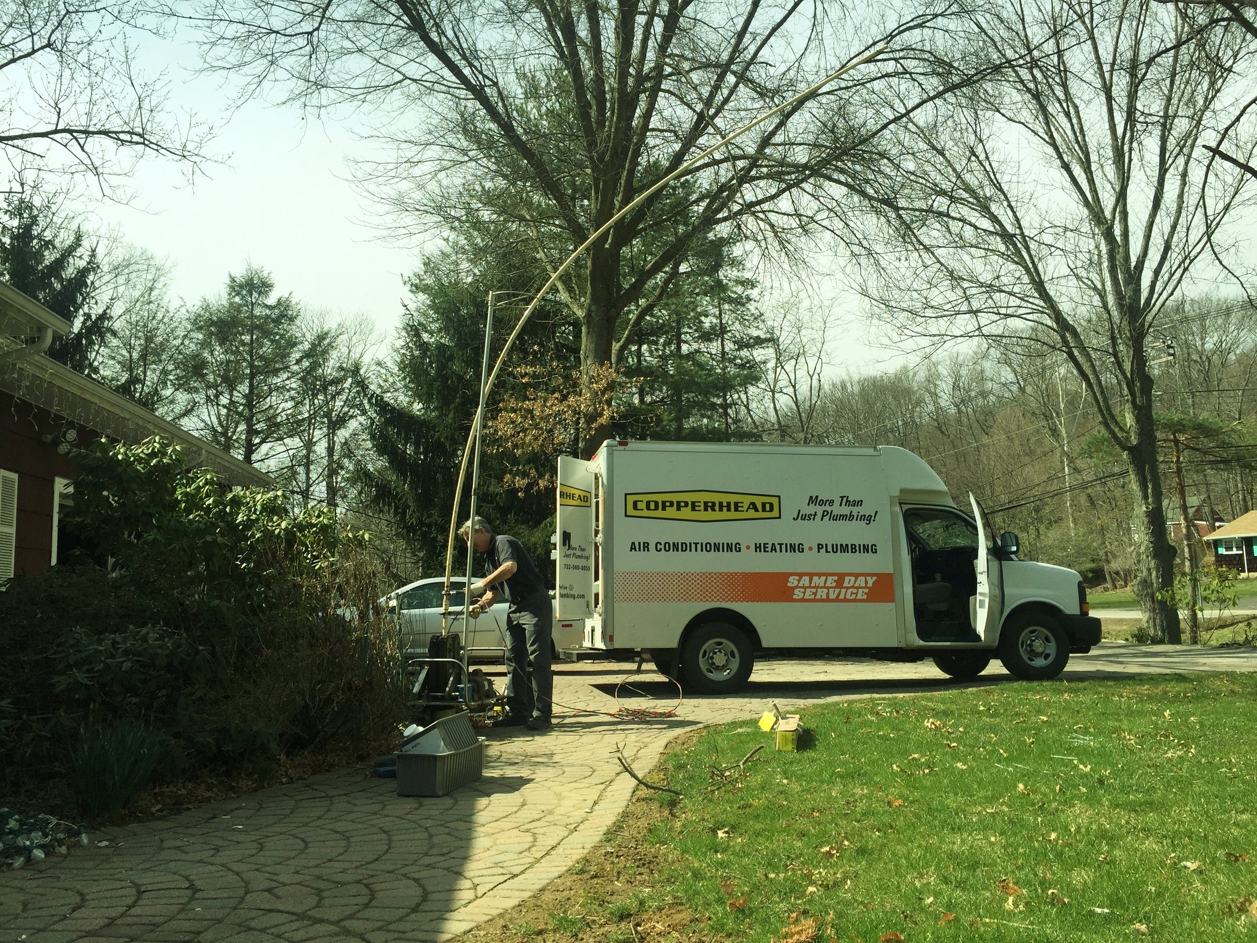 Snapshot of an emergency no-water call: Tom pulls and replaces a customer's submersible well pump.