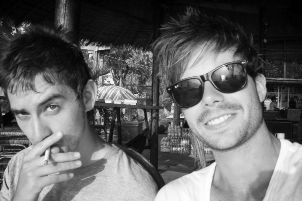 My friend Andrew Nummey and I having a beer down on the beach after a day exploring the city.