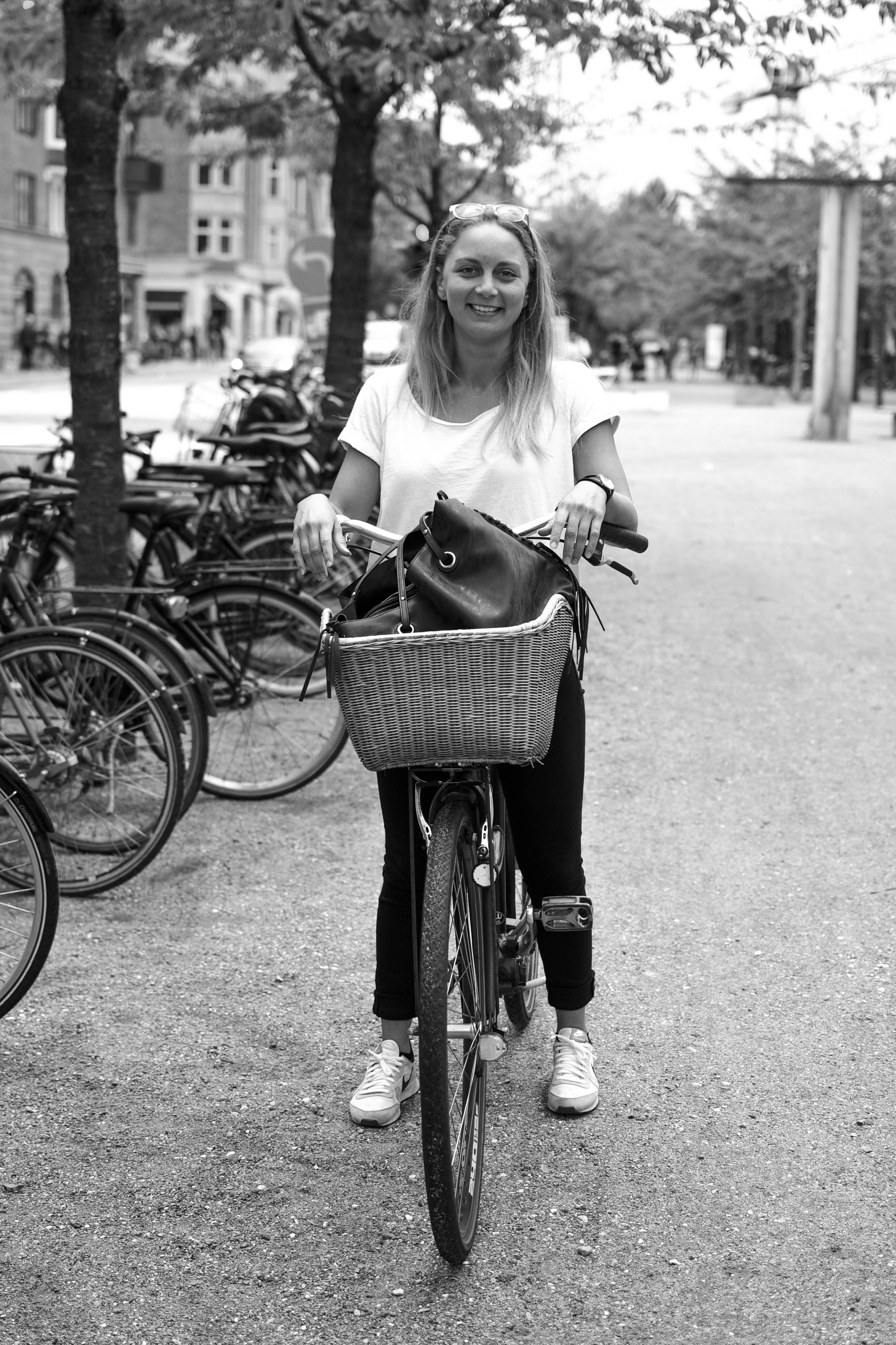 "I pretty much don't go anywhere without my bike!" .... Olivia hanging with her friends down by Islands Brygge. 