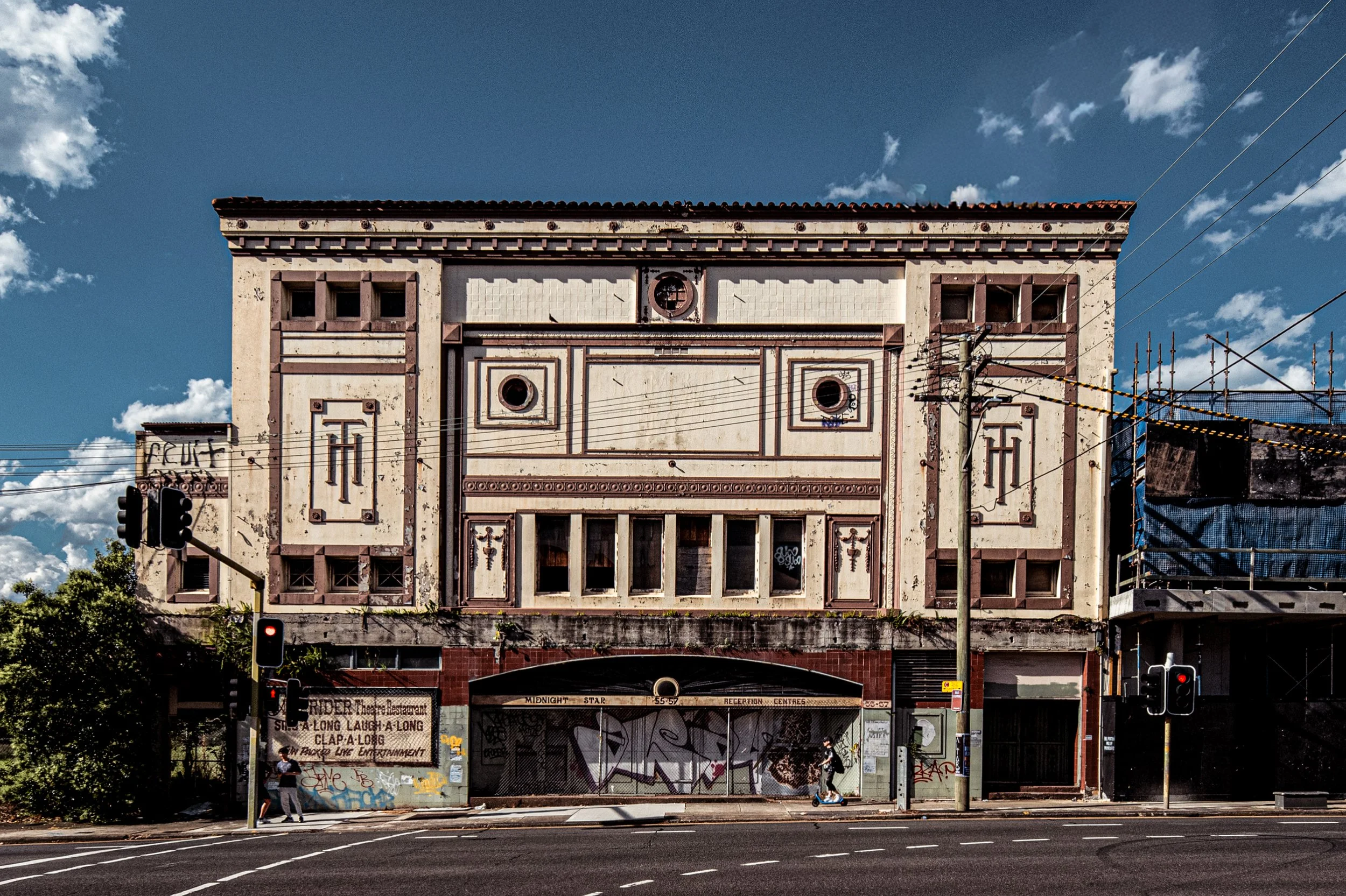  Midnight Star, 55–57 Parramatta Road, Homebush  Built in 1925 as the Homebush Theatre by architect Charles Boringer, this Interwar cinema was part of the suburban picture-palace network that once lined Parramatta Road. Its facade carries the  'HT' m