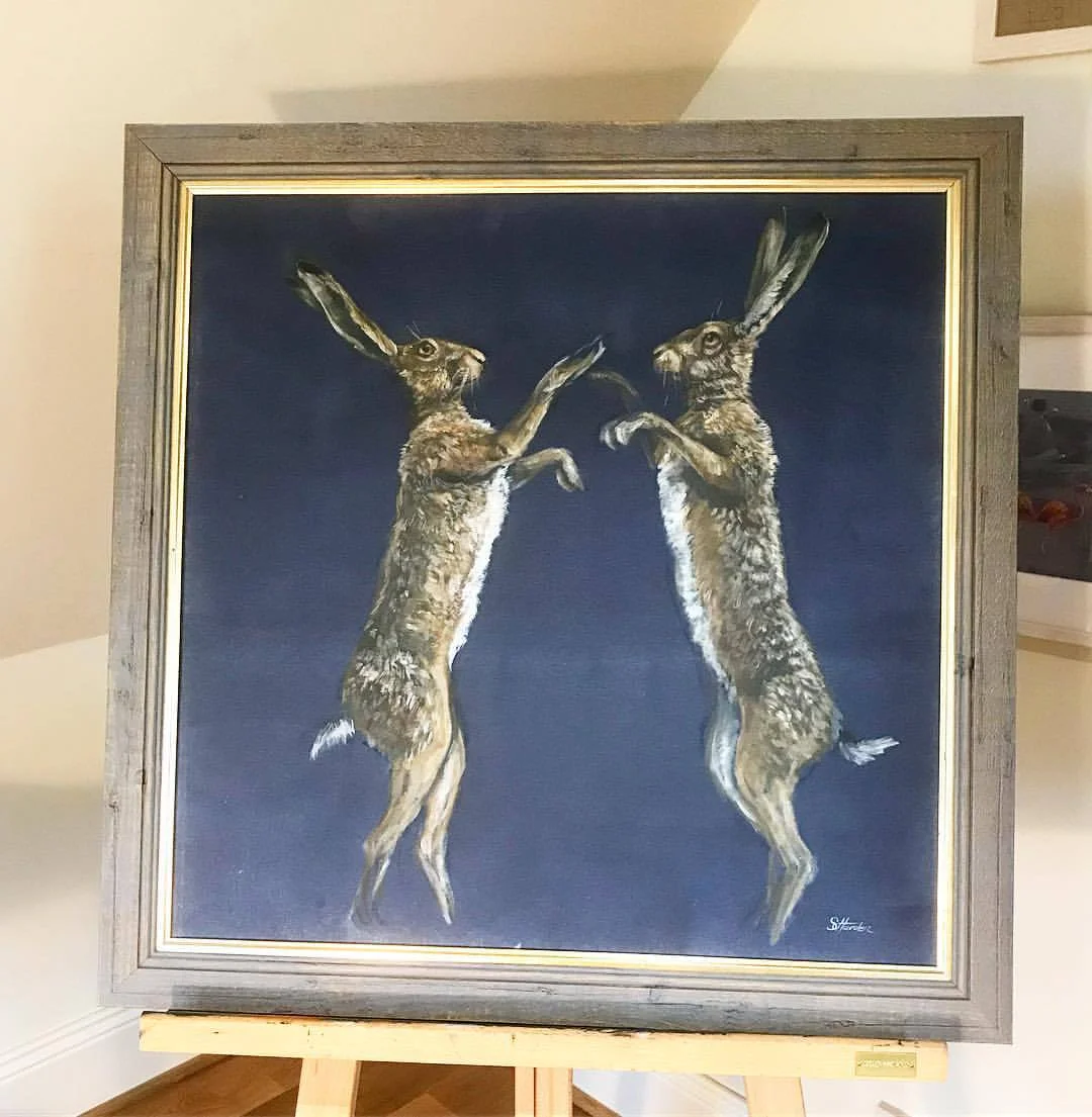 'Boxing Hares' Oil on canvas board. SOLD