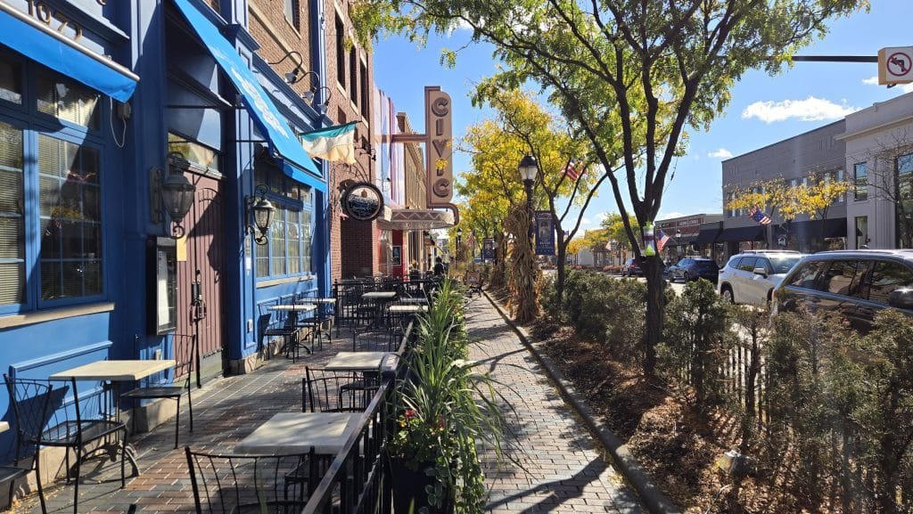 Cowleys, Civic on sidewalk looking east.jpg