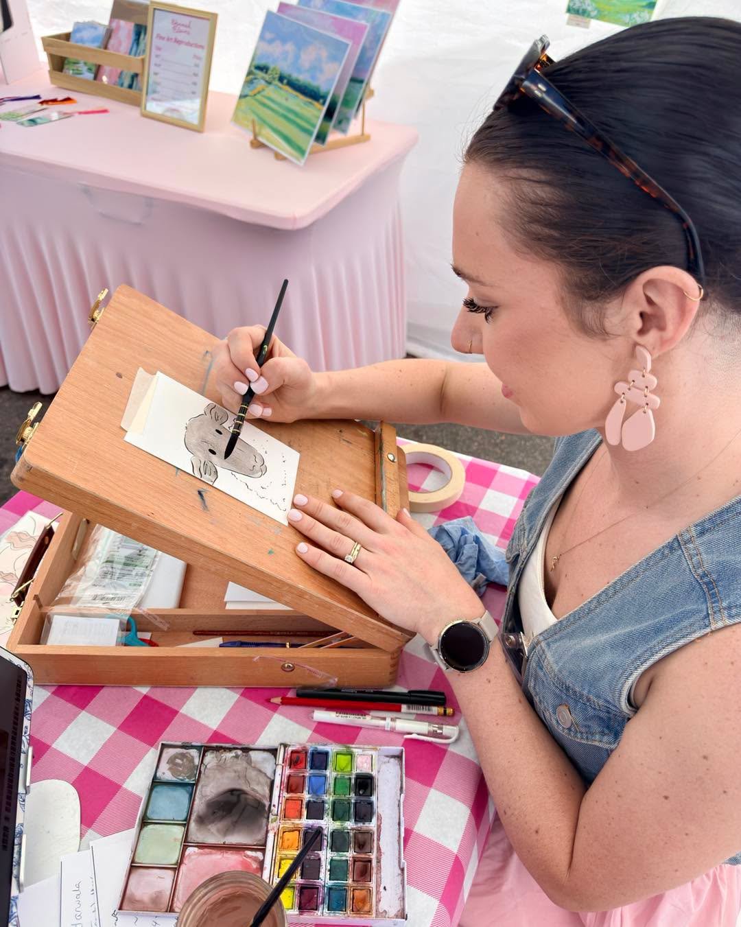 AOG - Hannah Chambo paints lamb for Rachel.jpg