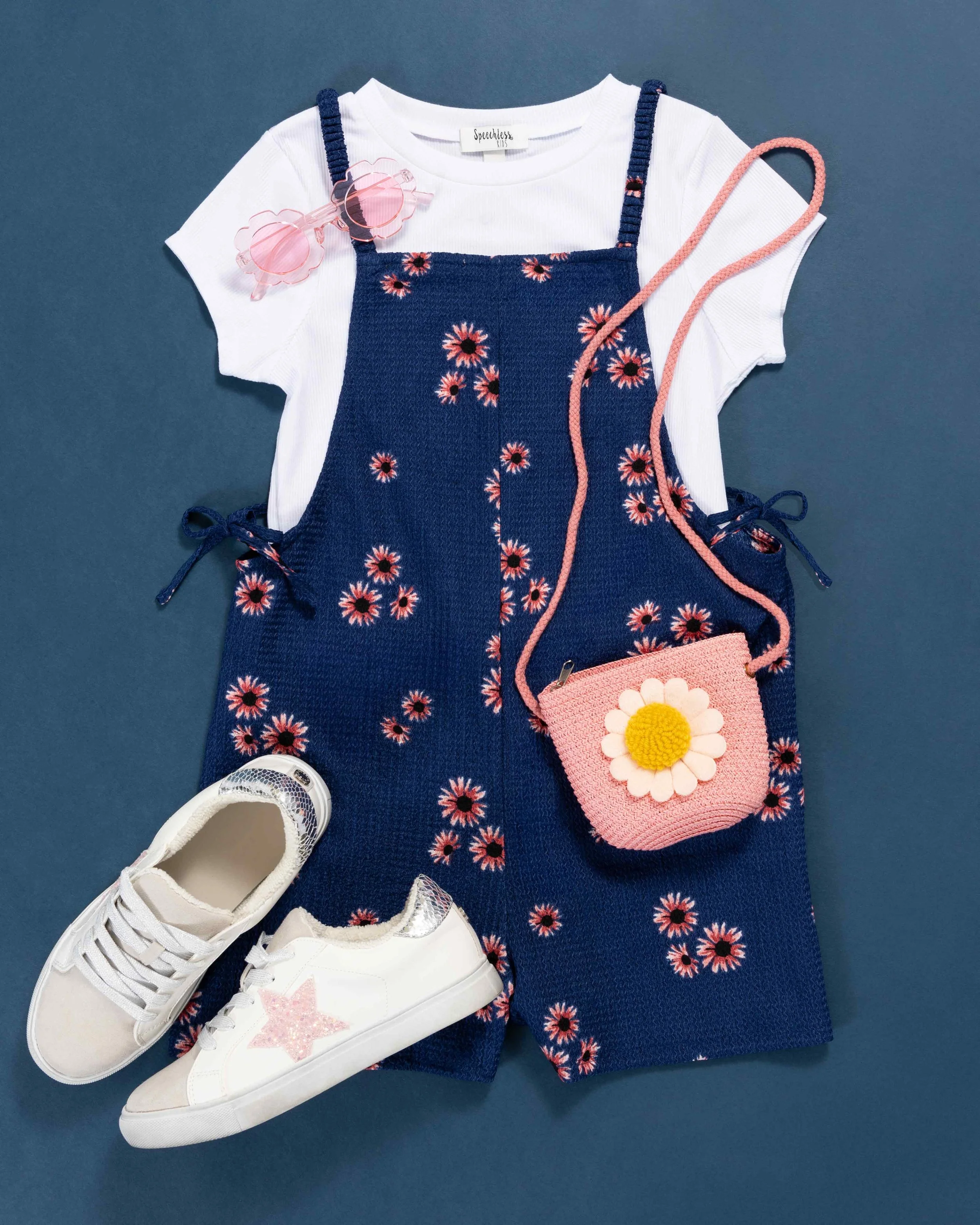 FlowerRomperOnNavy.jpg