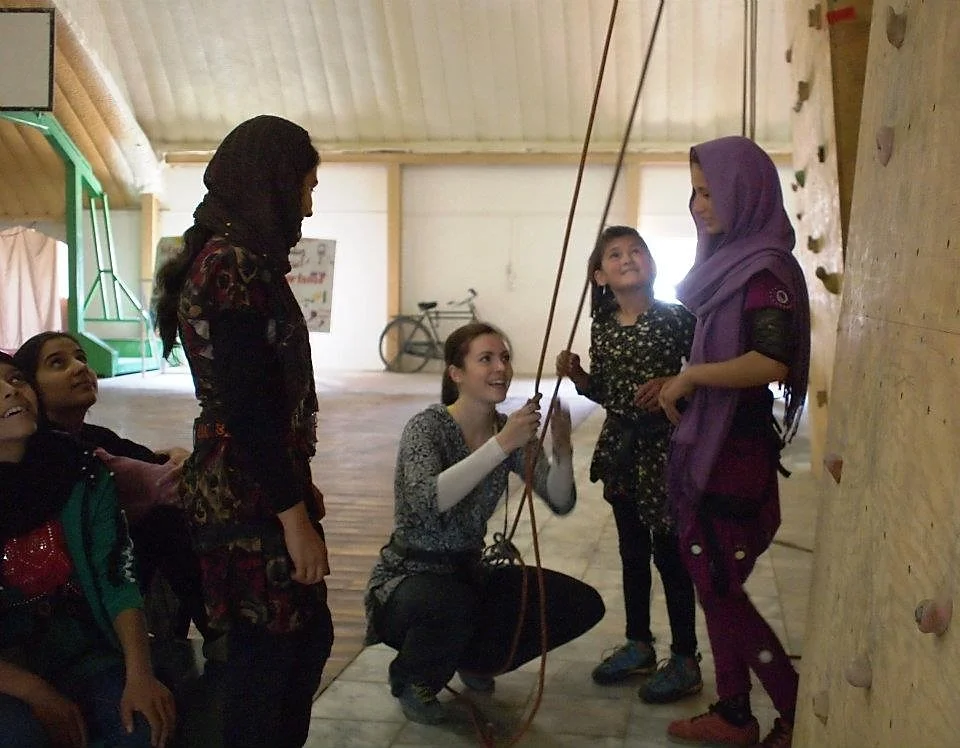 Girls learning to Belay