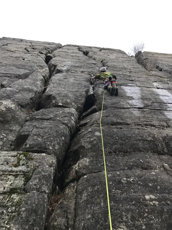 Harry heads up on his first trad lead of the season at Stonehill. 
