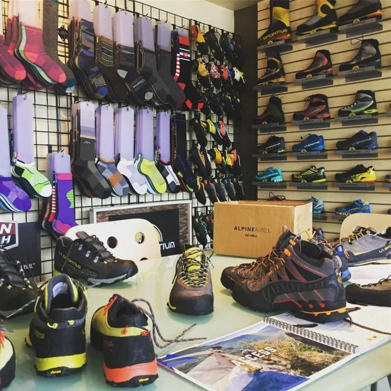 Comparing approach shoes in the La Sportiva line up at the secret lair of Pinnacle NW Sales group in Ballard