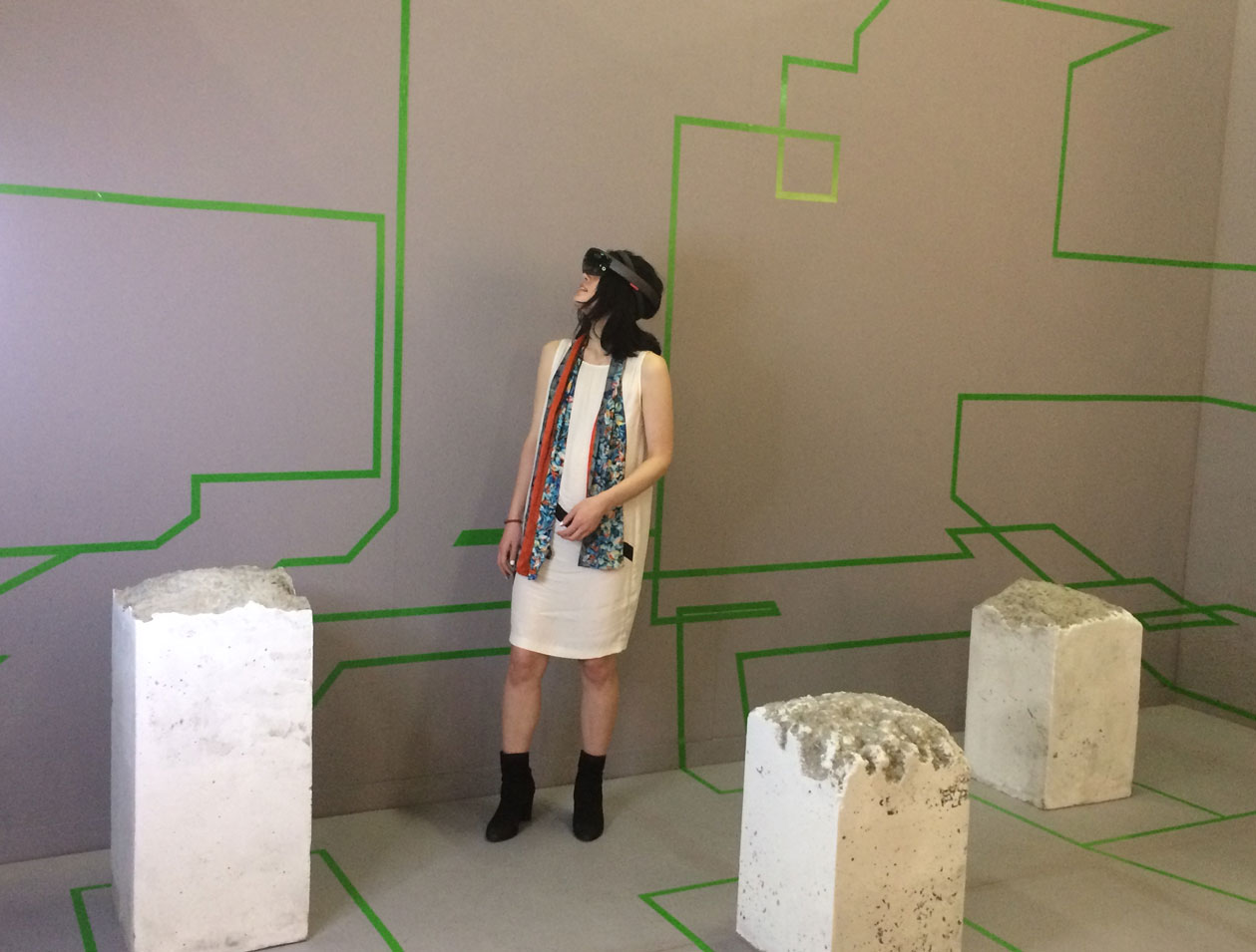 Artsy Projects: Concrete Storm , Mixed Reality Environment by Studio Drift “Concrete Storm—synthesizing art, technology, and nature—is the first mixed reality project by Studio Drift, the Dutch collective of Ralph Nauta and Lonneke Gordjin. On first impression, visitors experience solid forms, which draw on minimalist motifs and underscore the stable properties of concrete. With Microsoft HoloLens, viewers enter a mixed reality, enlivened by responsive holograms that augment the installation’s physical environment. The artists explore the layer between the parallel worlds, where reality and virtual worlds co-exist.”