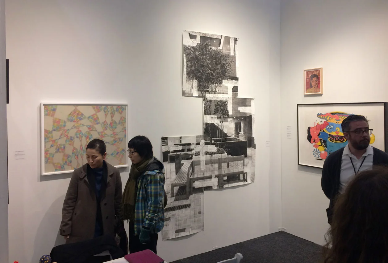 Owen Houhoulis of Owen James Gallery at his booth