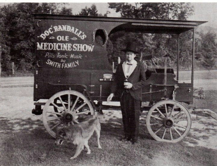 old fashioned snake oil with dog.png