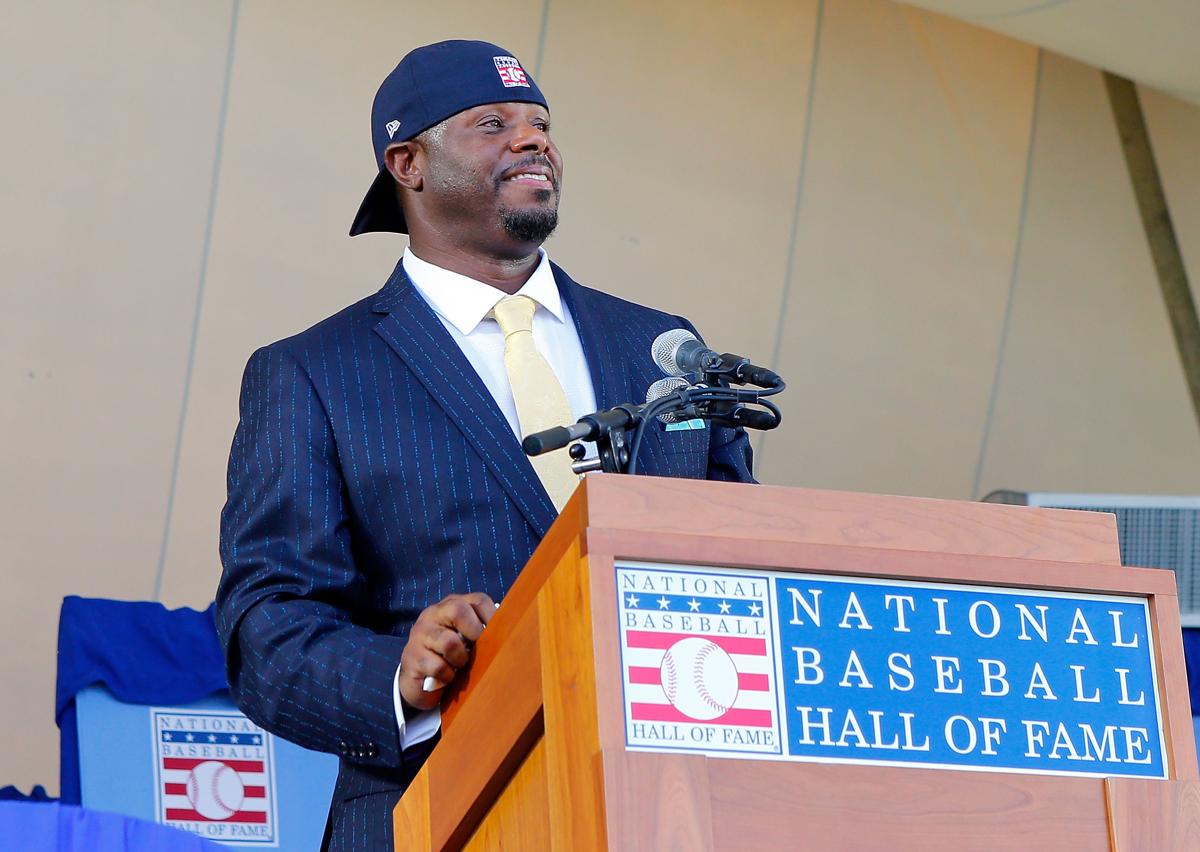 Junior ended his speech by pulling out a Hall of Fame hat and putting it on backwards in classic Griffey style. Photo from Boston Globe