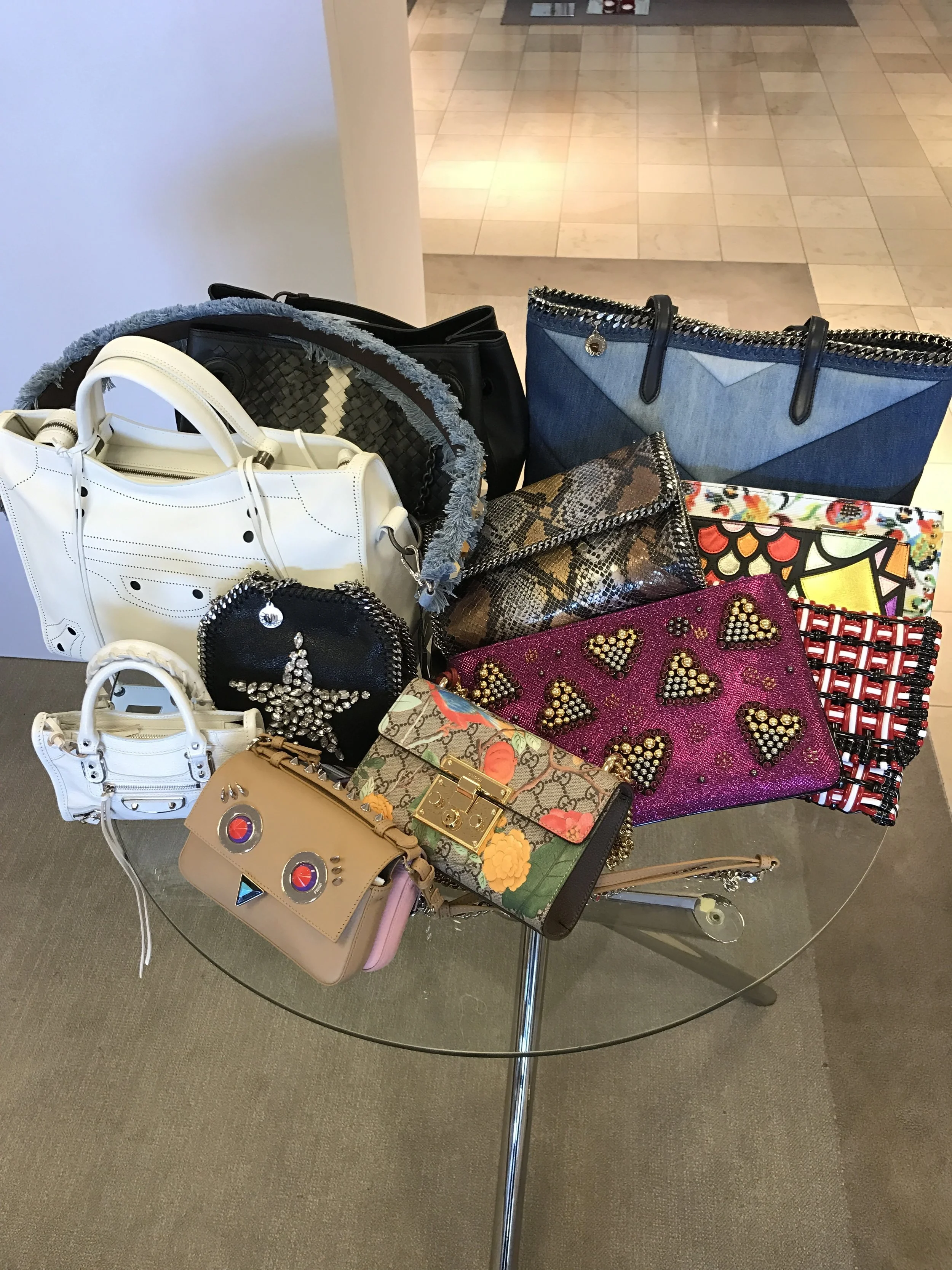 Gotta love a bag that makes a statement!!!! The in thing to have at the moment is the mini bag/regular bag combo. Yes you carry both at the same time ;). Sounds crazy, but it's a thing.