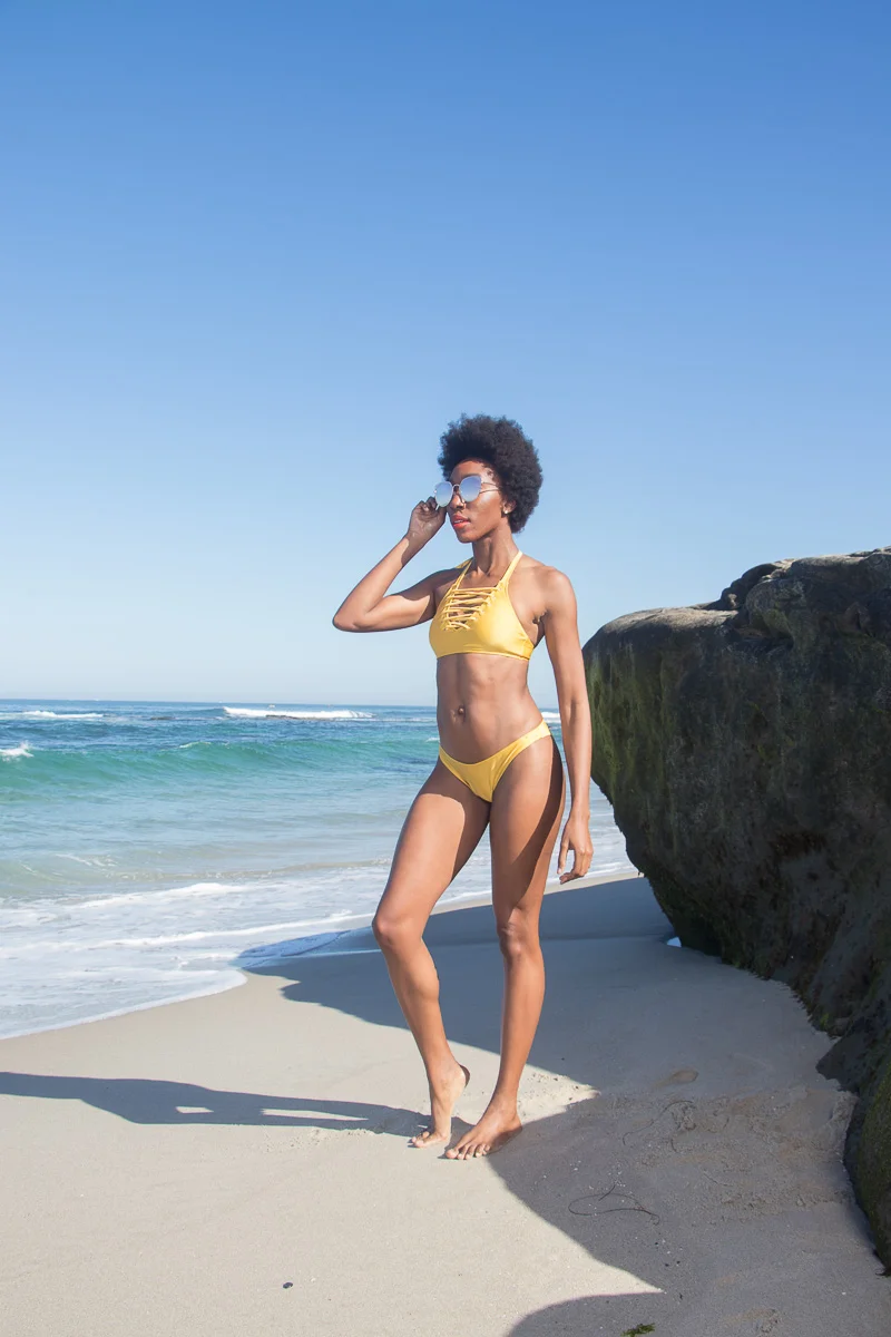 Forever 21 - I just recently stopped by forever 21 to get this bikini and they have quite a bit to choose from!!! I loved the color variety and this golden yellow stood out to me and really compliments my skin tone!!! Win win win!!! Another thing... it wasn't expensive I believe it was $9.99 each for the top and bottoms. I love a good bargain and don't like to pay a crazy amount for swim wear, because I don't wear them as often as I wear regular clothes.