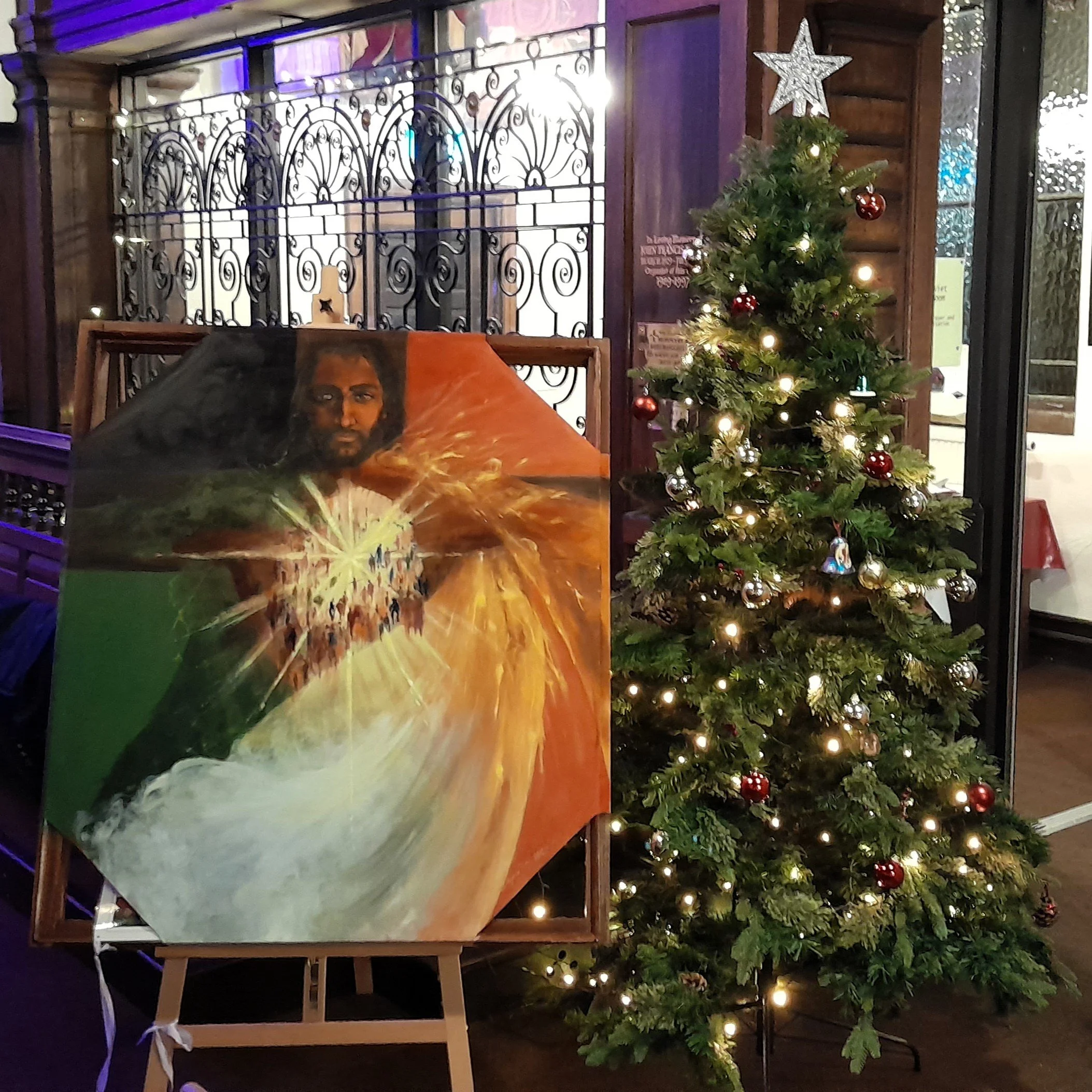  The Nativity painting beside the Christmas tree at at Sacred Trinity Church, Salford, which has hosted an Open Table community since 2017. Click on the image to enlarge it. 