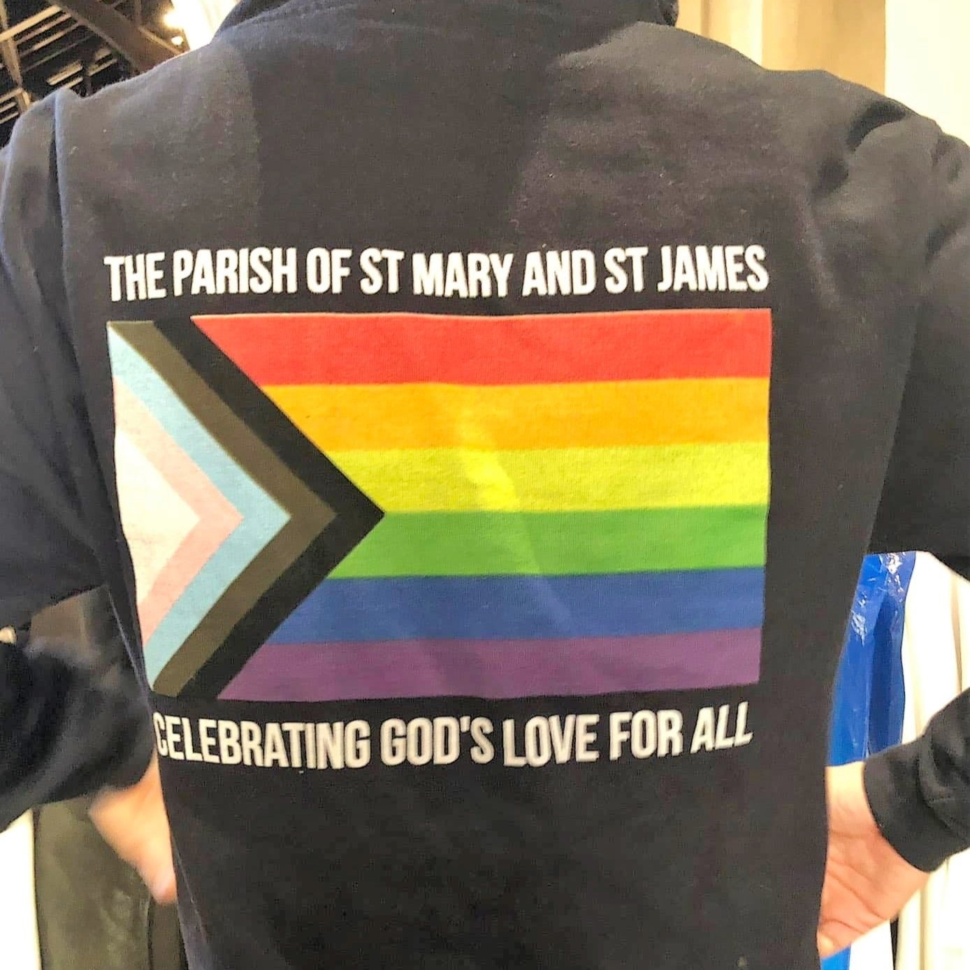  Robert’s parish team has sweatshirts displaying the Progress Pride flag with the slogan ‘Celebrating God’s love for all’ 