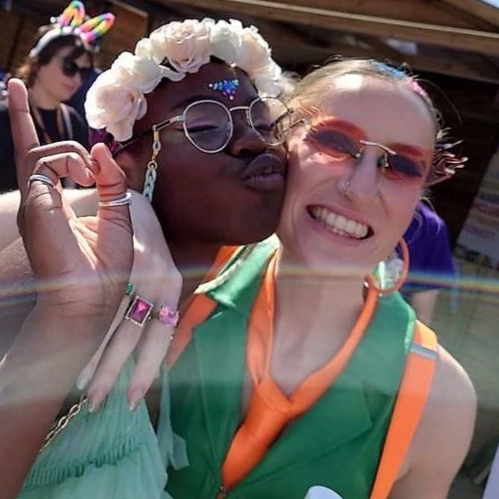  A young woman kisses another woman on the cheek at Chester Pride.  READ MORE . 