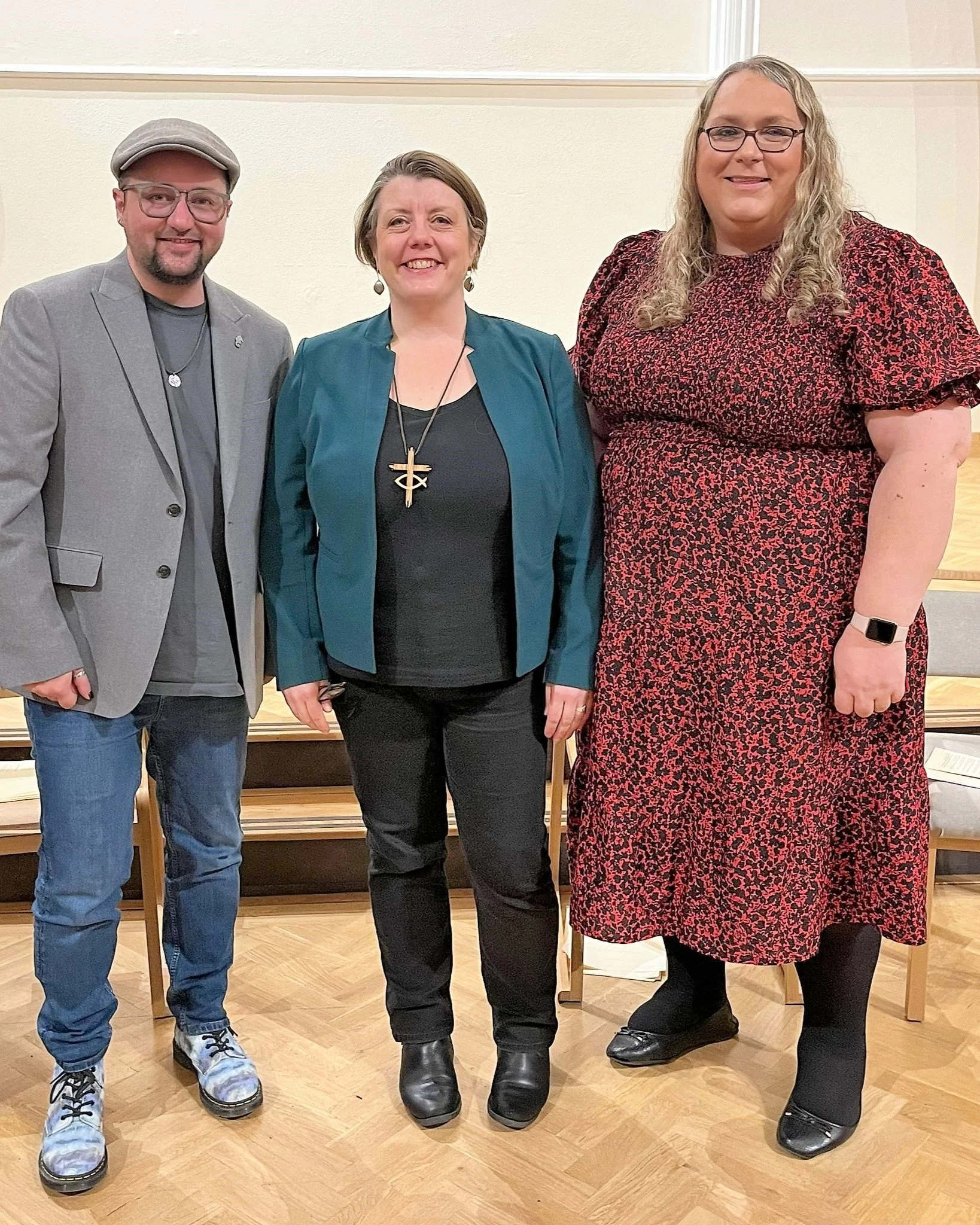 Revd Fiona Bennett (centre), URC General Assembly Moderator 2022-23, with OTN Co-Chairs Revd Dr Alex Clare-Young (left) and Ms Sarah Hobbs (right) at a vigil for Trans Day of Remembrance at Downing Place United Reformed Church, Cambridge, in November 2022.