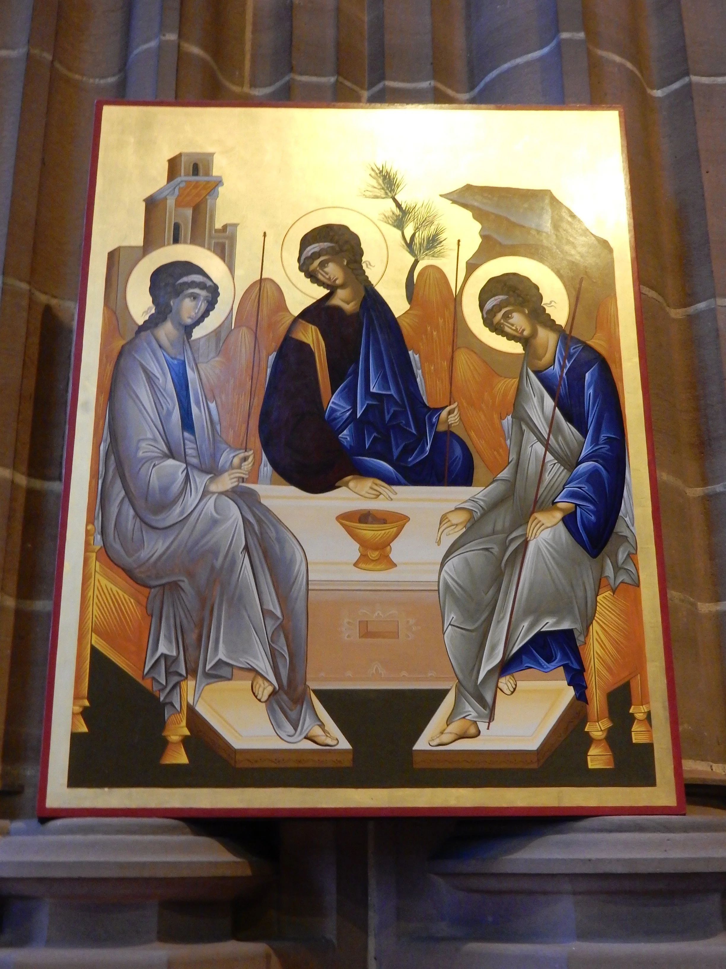  On display in the baptistry of Liverpool Cathedral, a modern copy by Cristi Paslaru of the 15th Century icon of the hospitality of Abraham by Andrei Rublev. PHOTO by  rlkitterman on deviantart.com . Click on the image to view in full screen. 